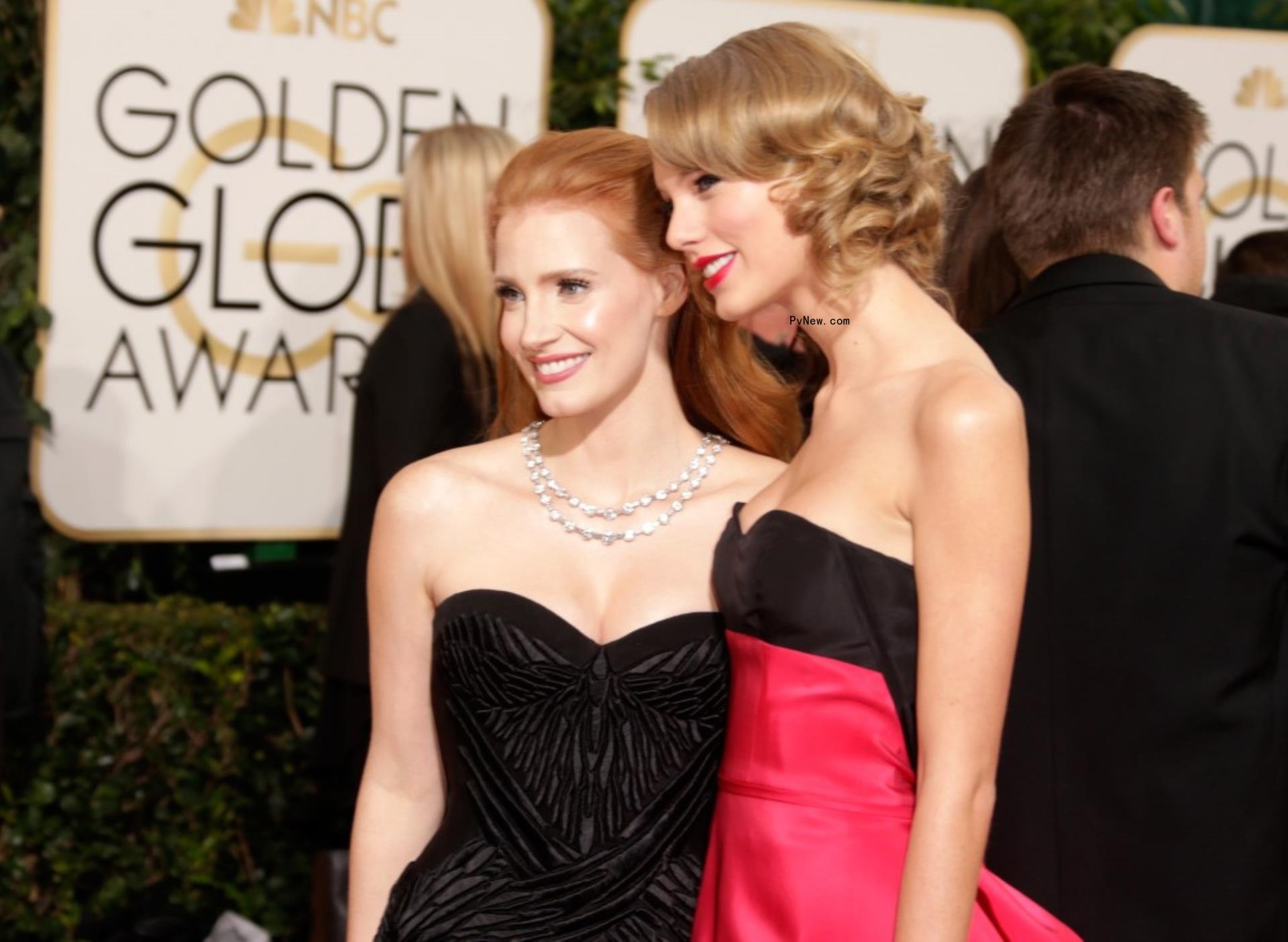 Taylor Swift and Jessica Chastain attend the 71st Annual Golden Globe Awards