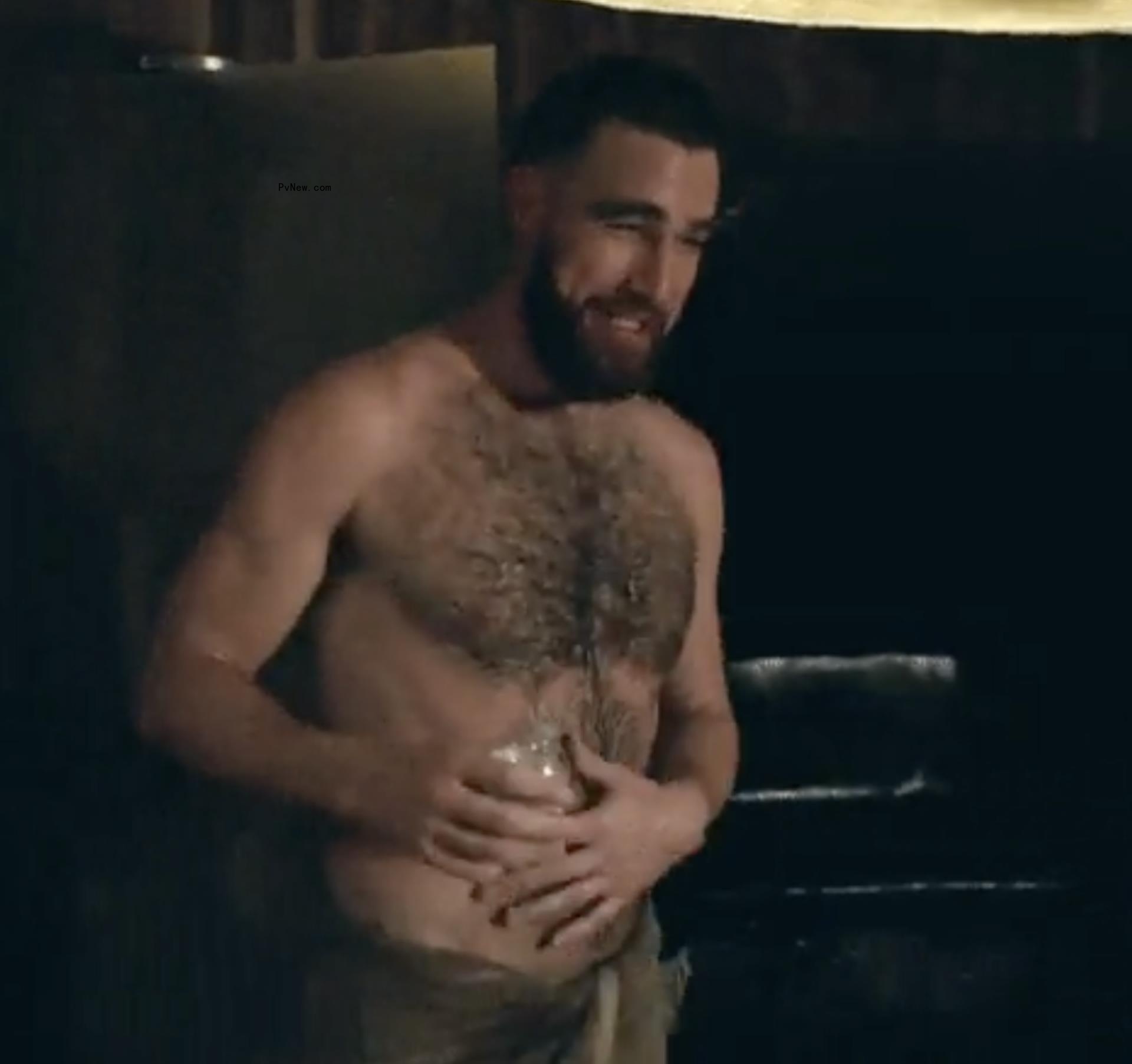 Travis Kelce in a towel