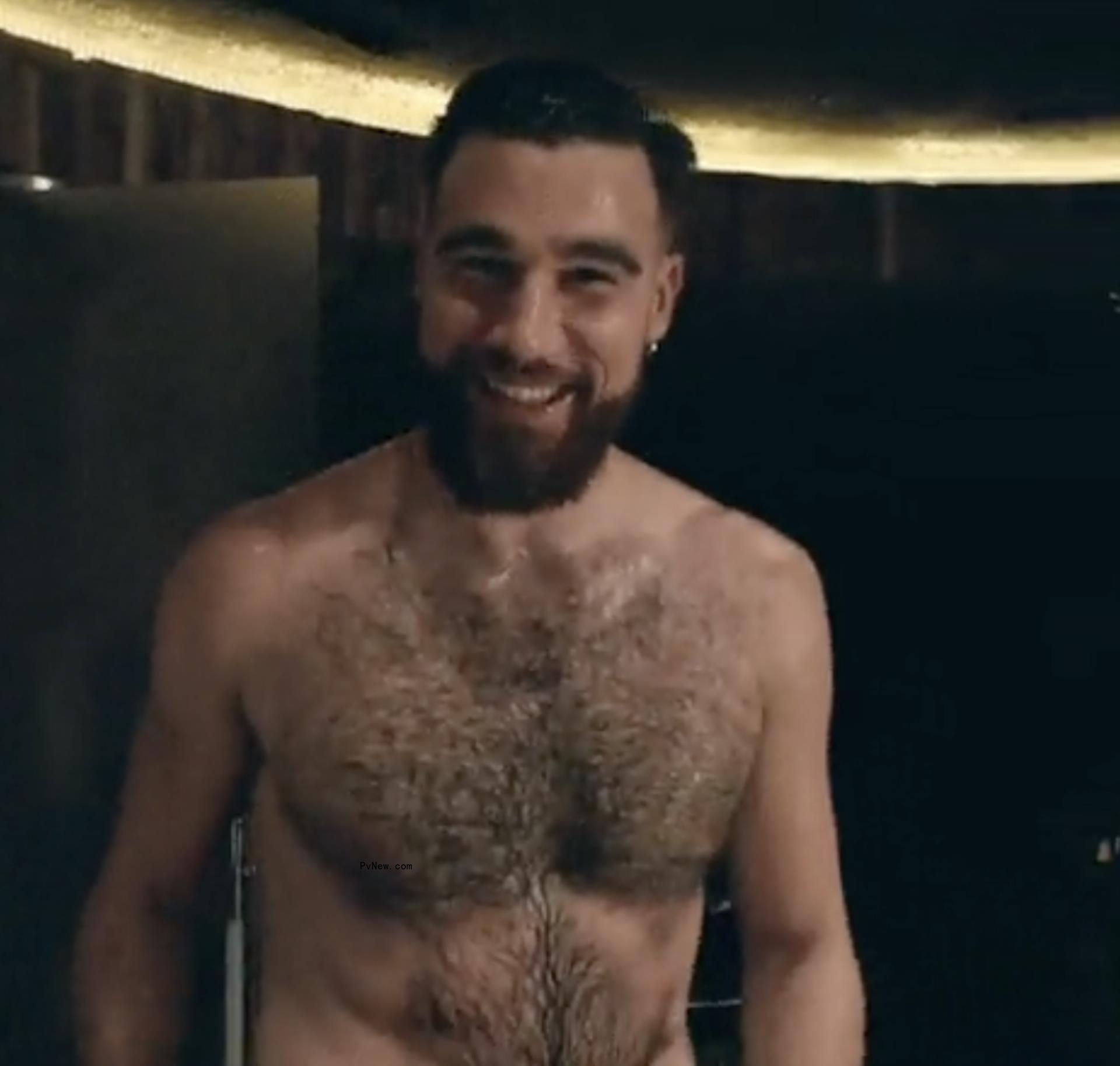 Travis Kelce in a towel