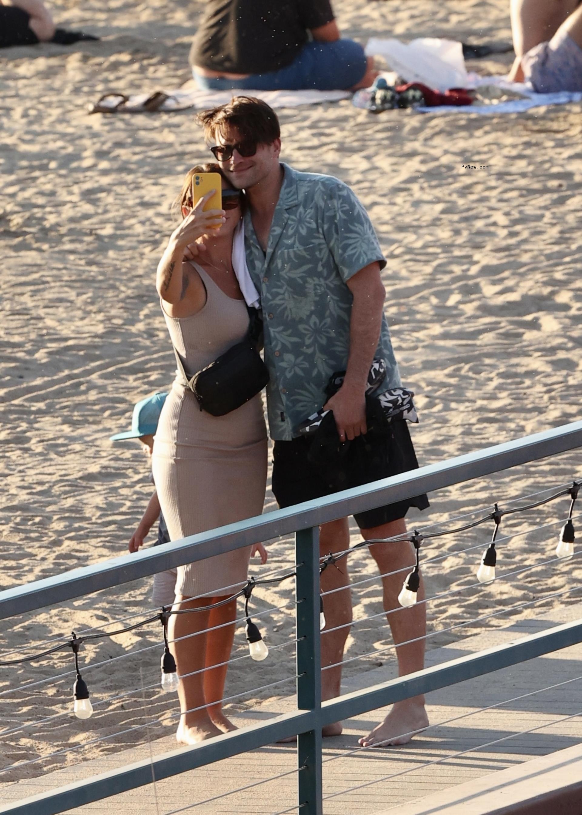 Tom Schwartz taking a selfie on a beach