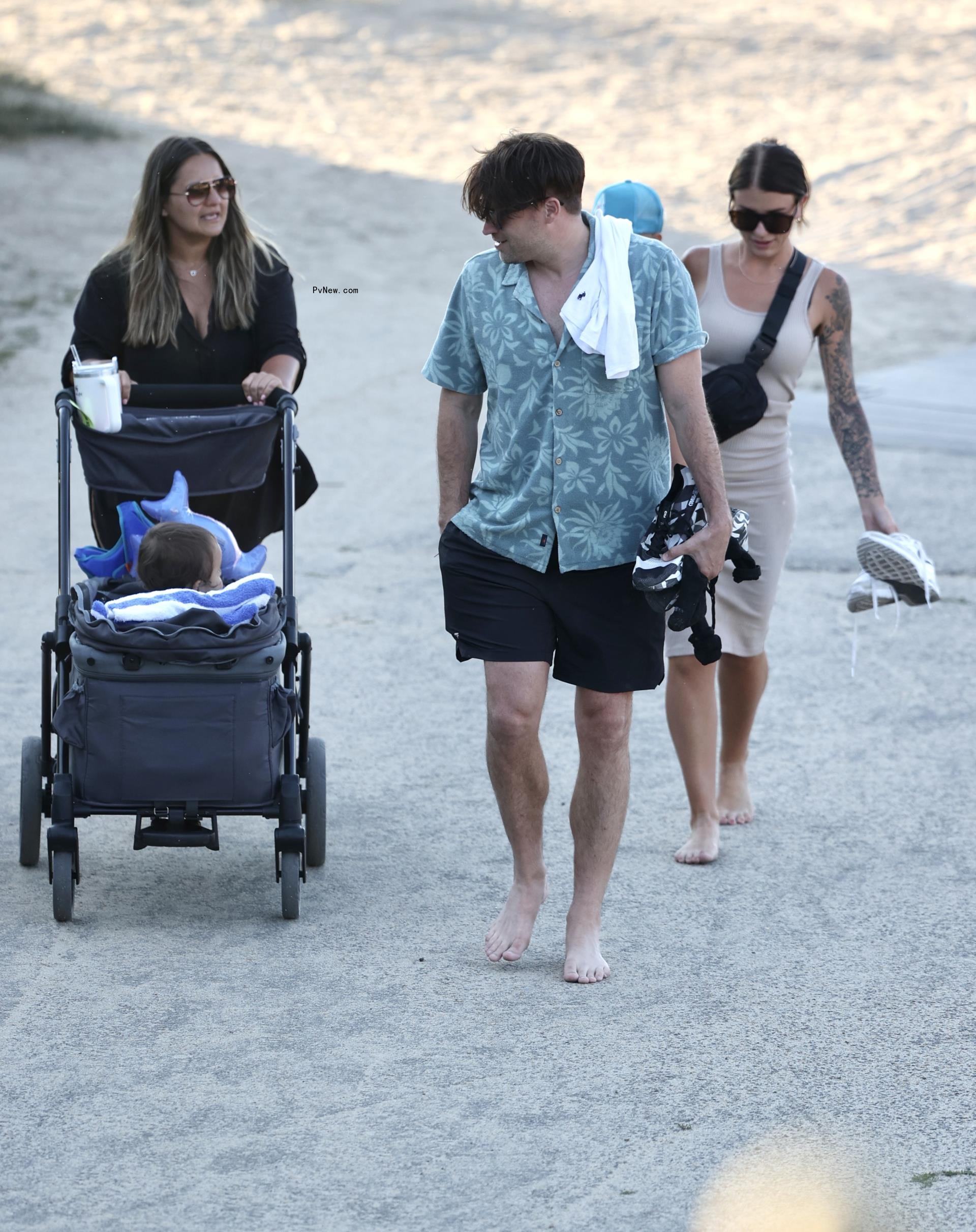 Tom Schwartz walking on the beach