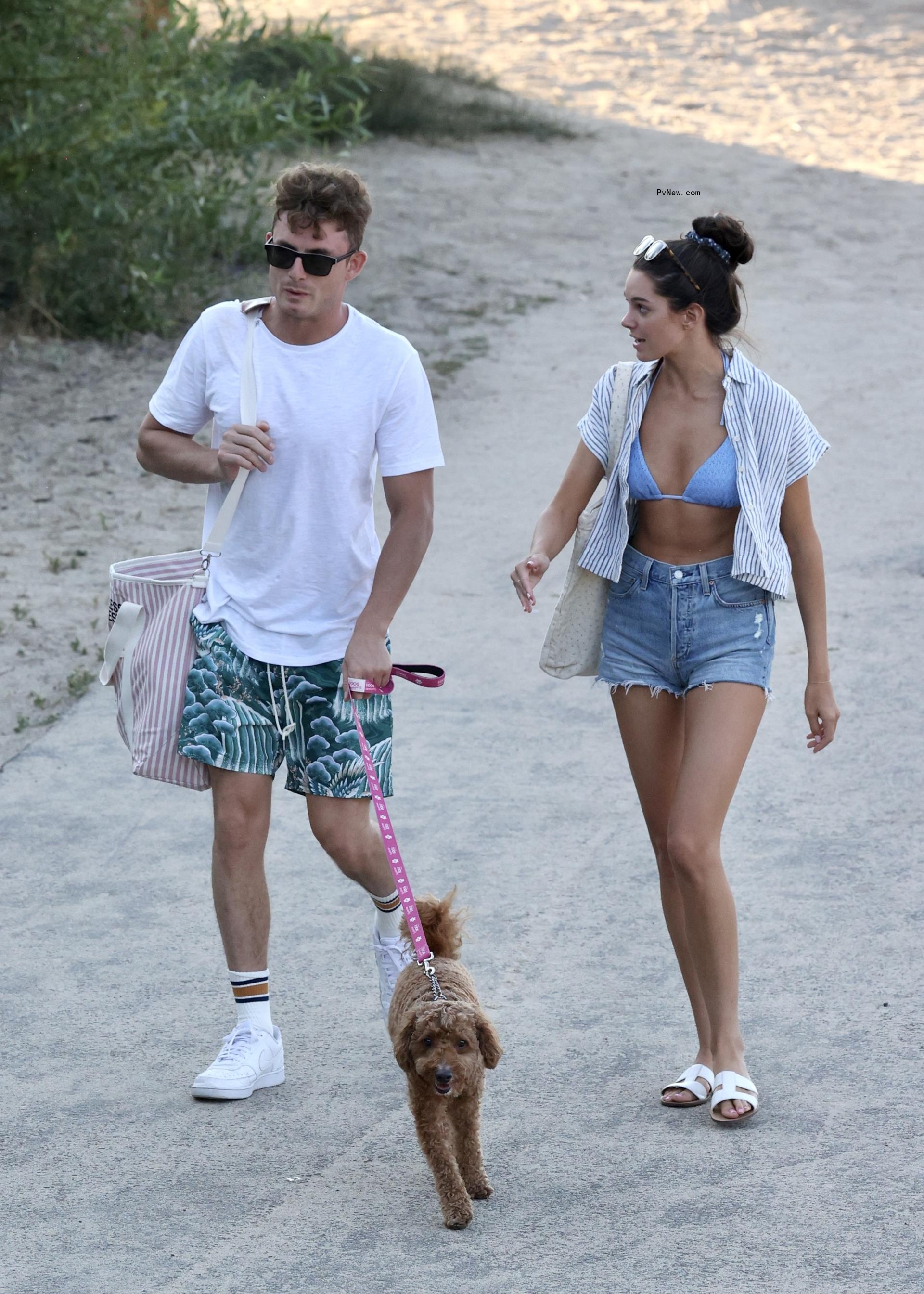 James kennedy and Ally Lewber walking their beach