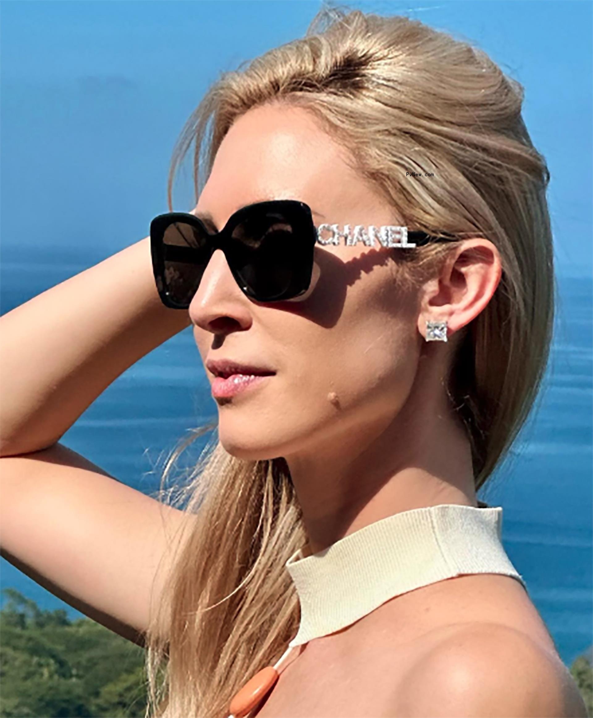 Lauren Boyette-Richards showing off her earrings.
