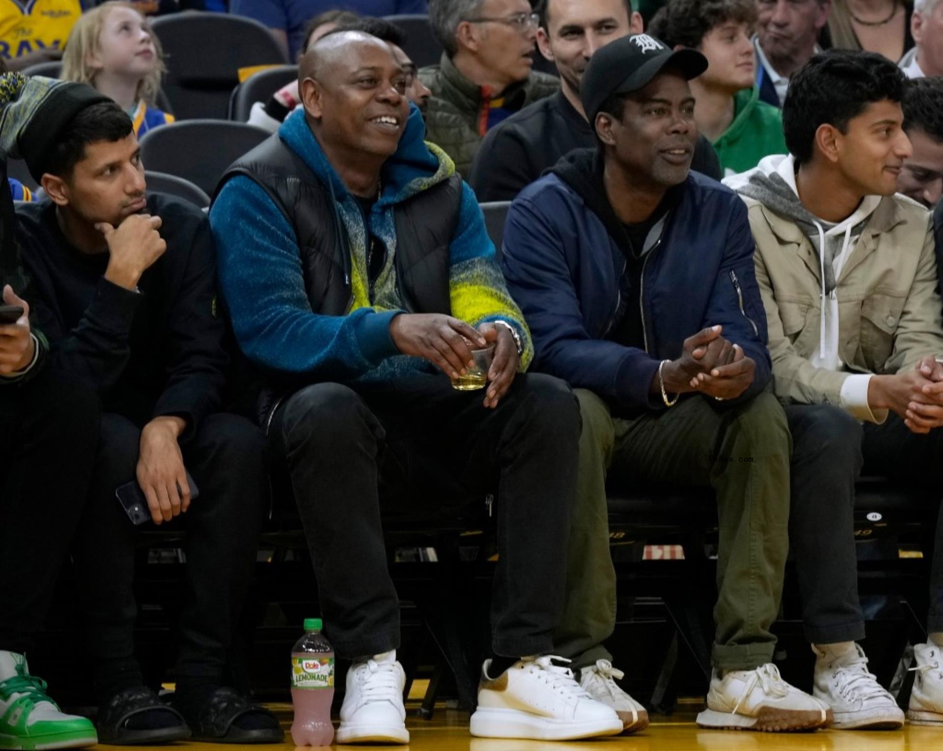 Dave Chappelle watching basketball