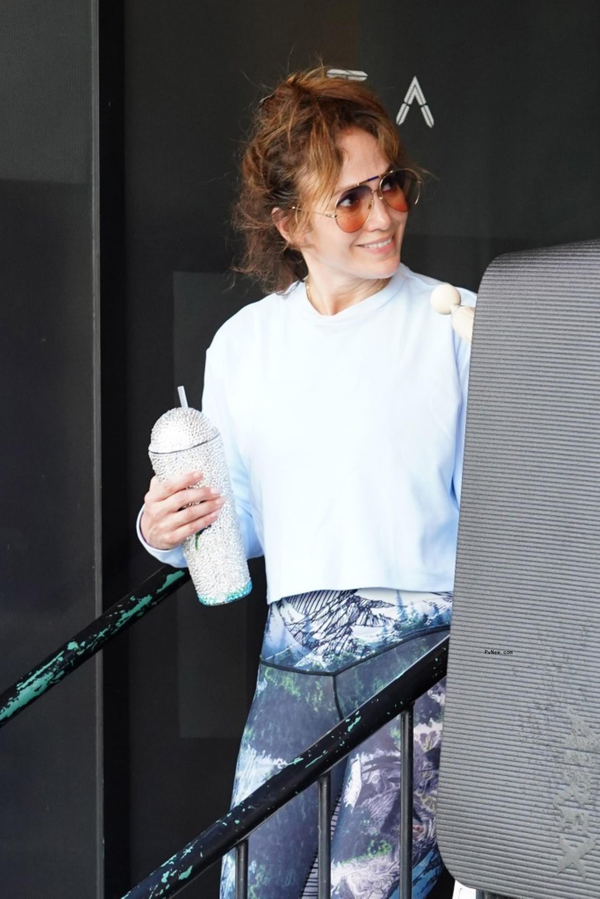 jennifer lopez exiting a fitness studio