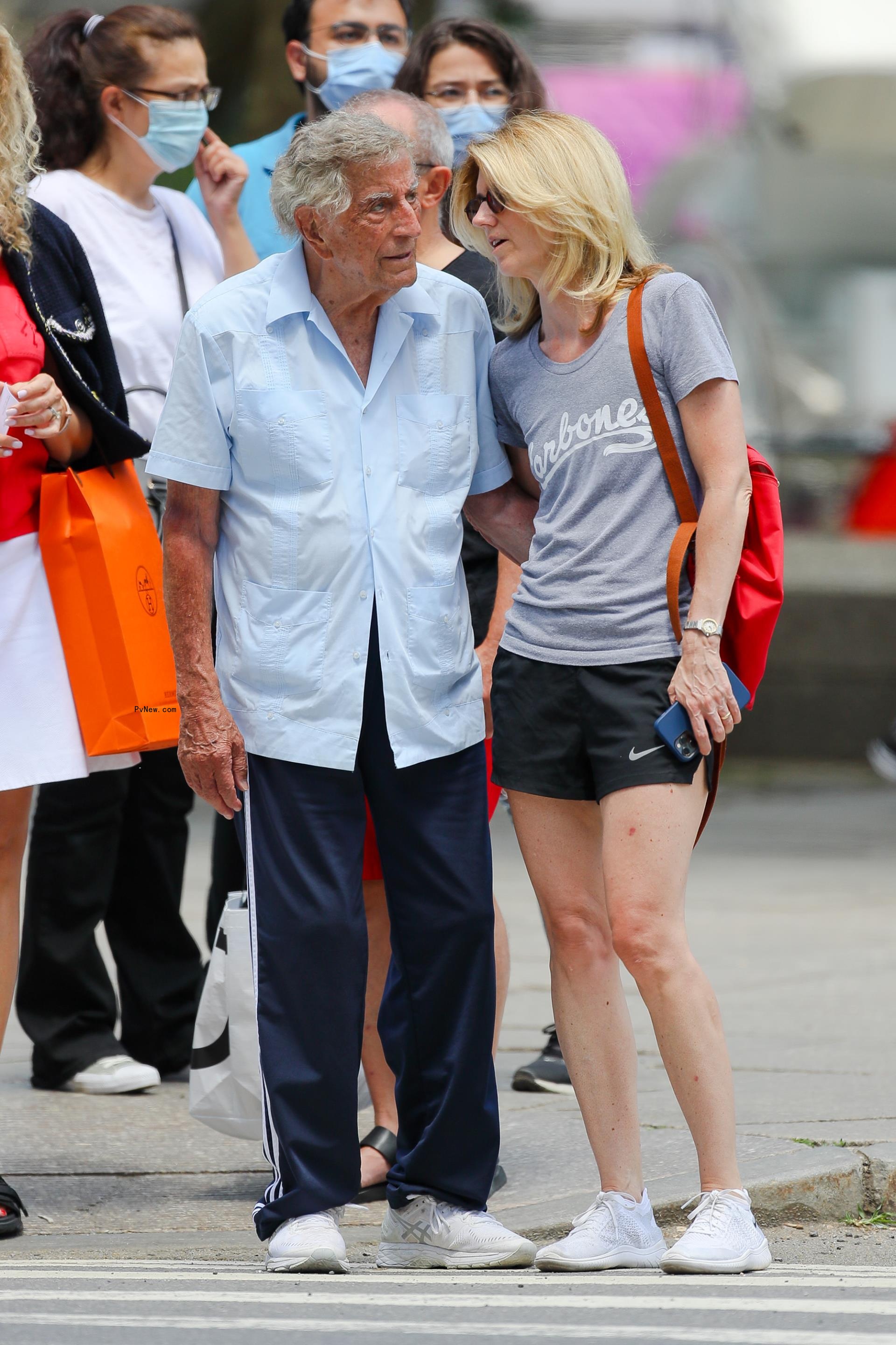 Tony Bennett and Susan Benedetto walking in Central Park together