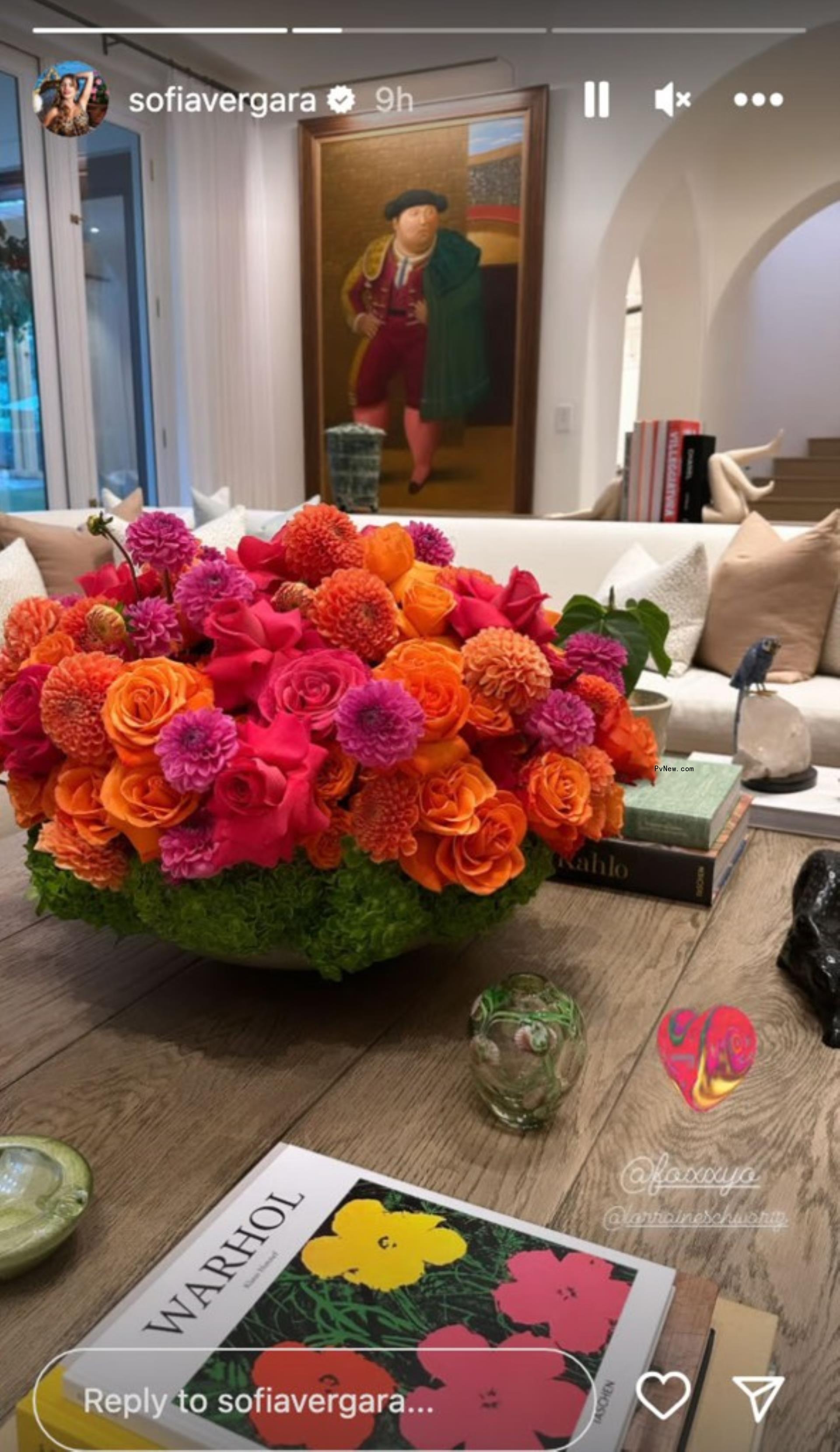 a coffee table with flowers
