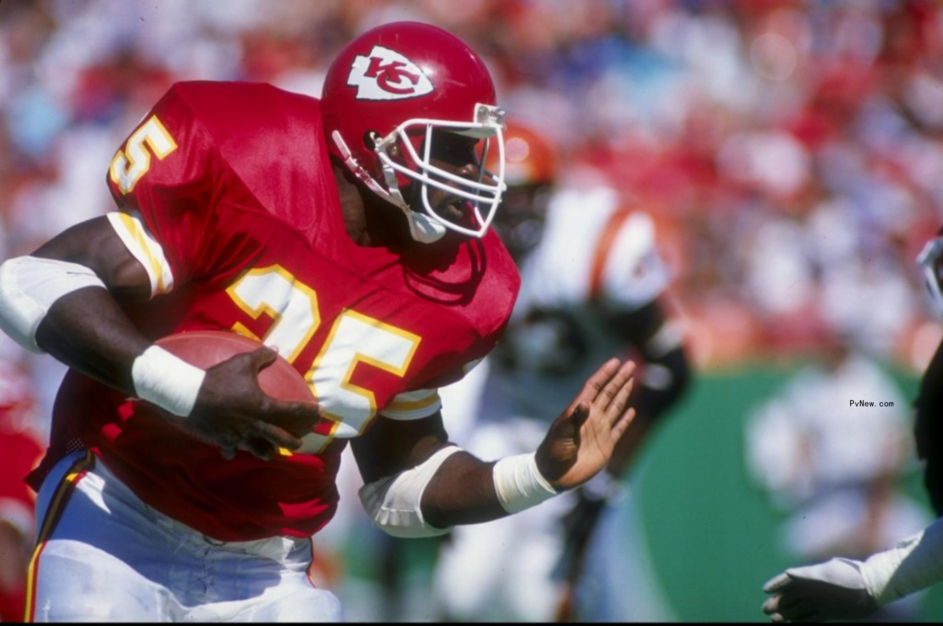 Christian Okoye playing football