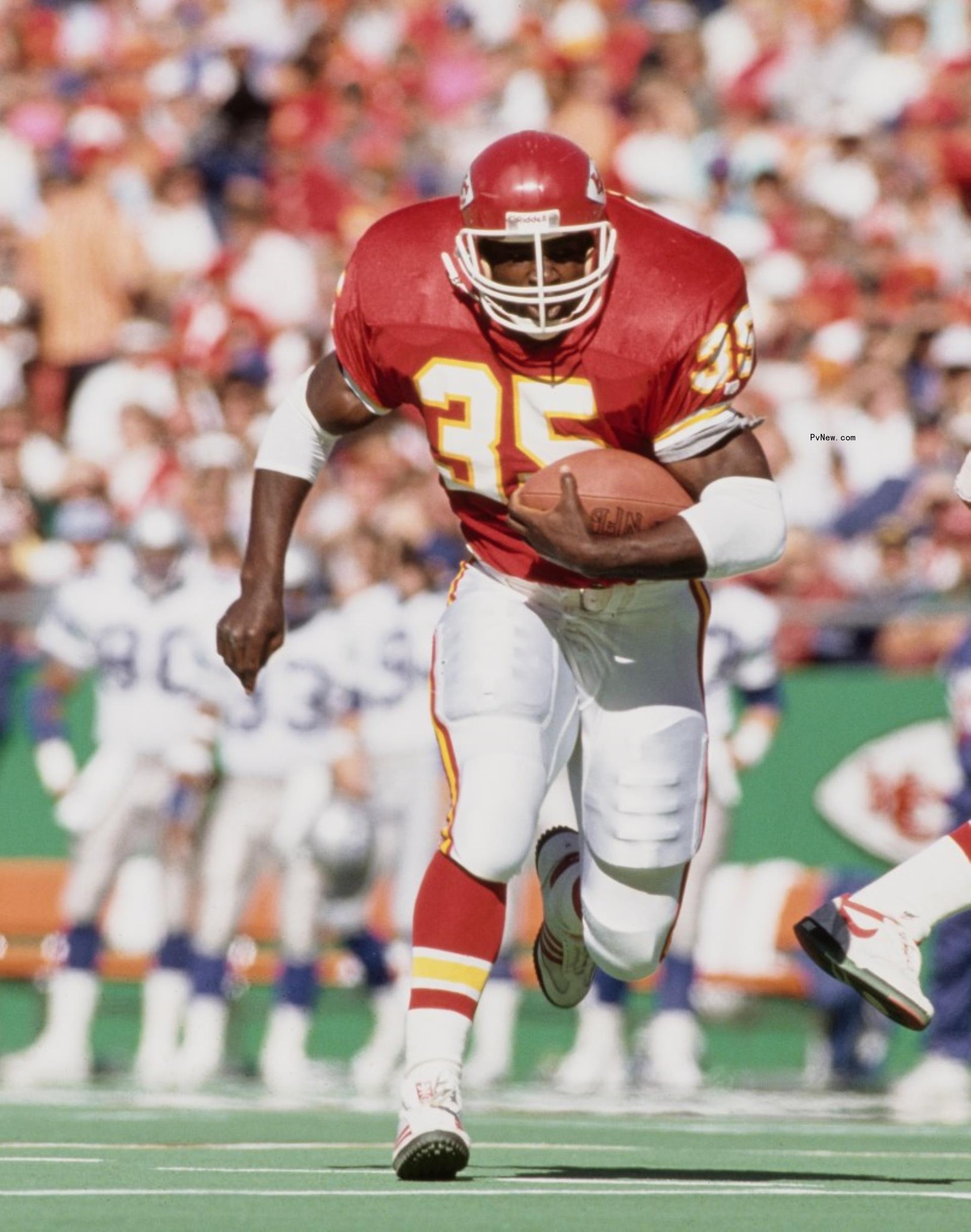 Christian Okoye playing football