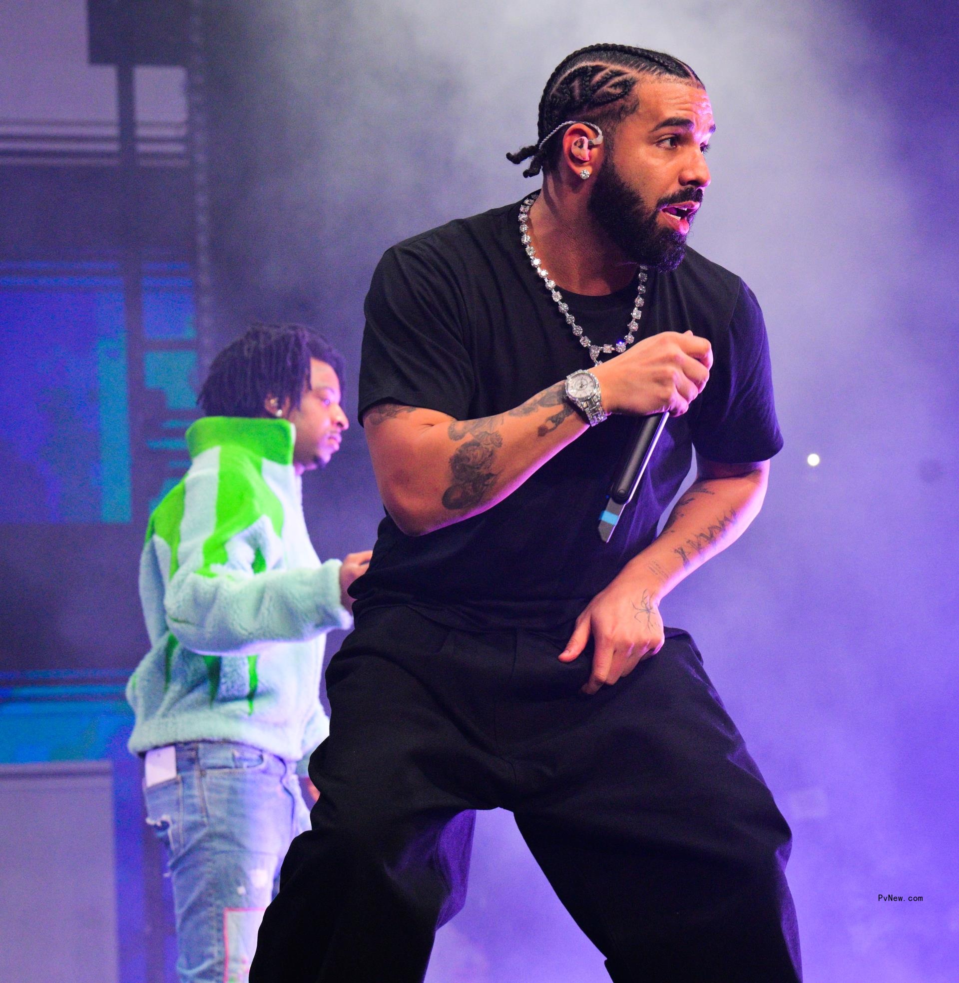 Drake and 21 Savage performing in 2022.