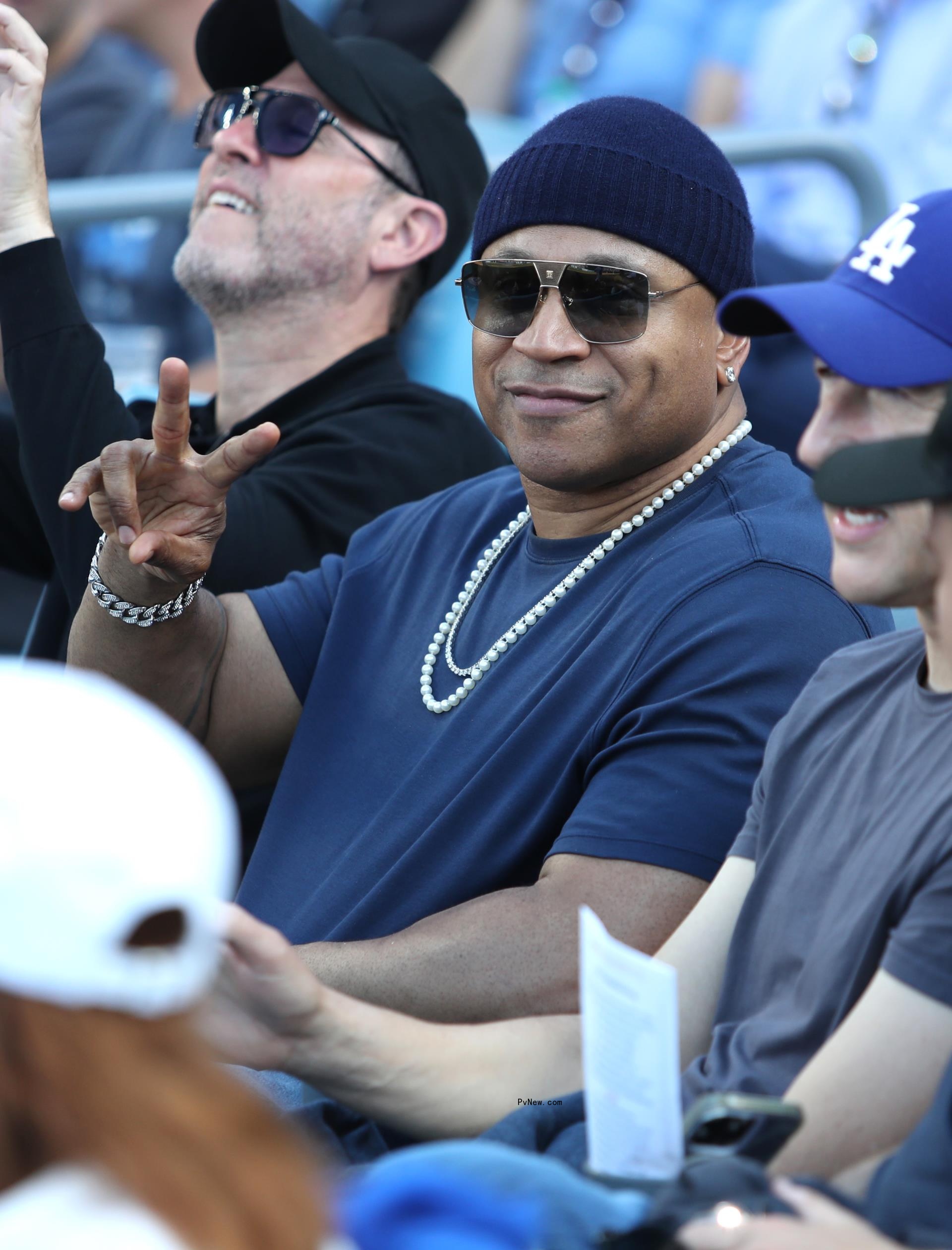 LL Cool J giving the peace sign.