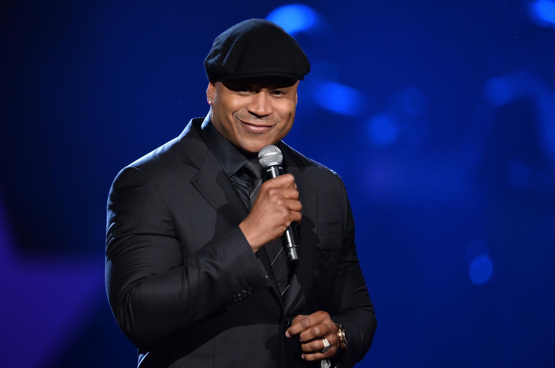 LL Cool J holding a mic.