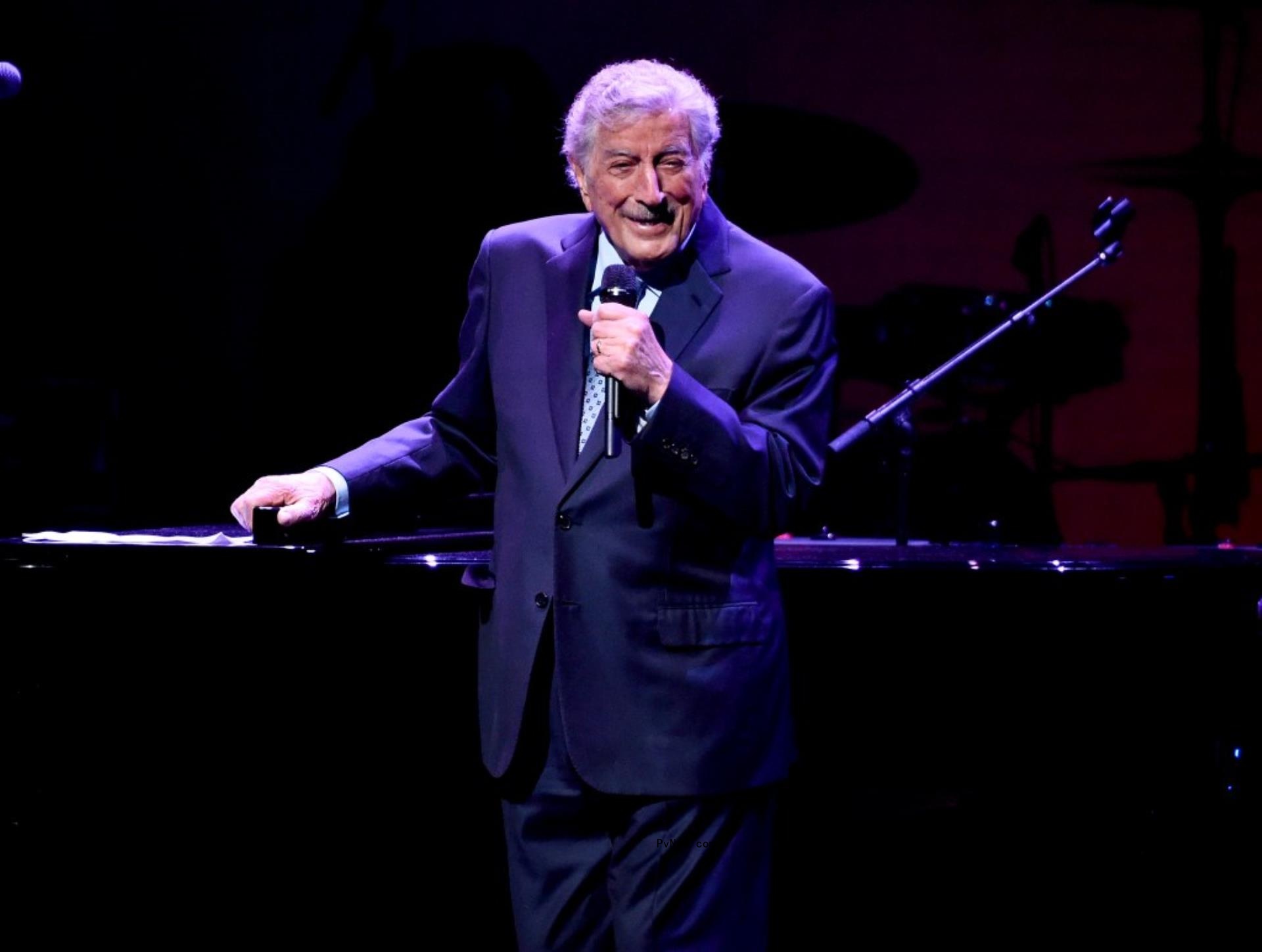 Tony Bennett performing on stage.