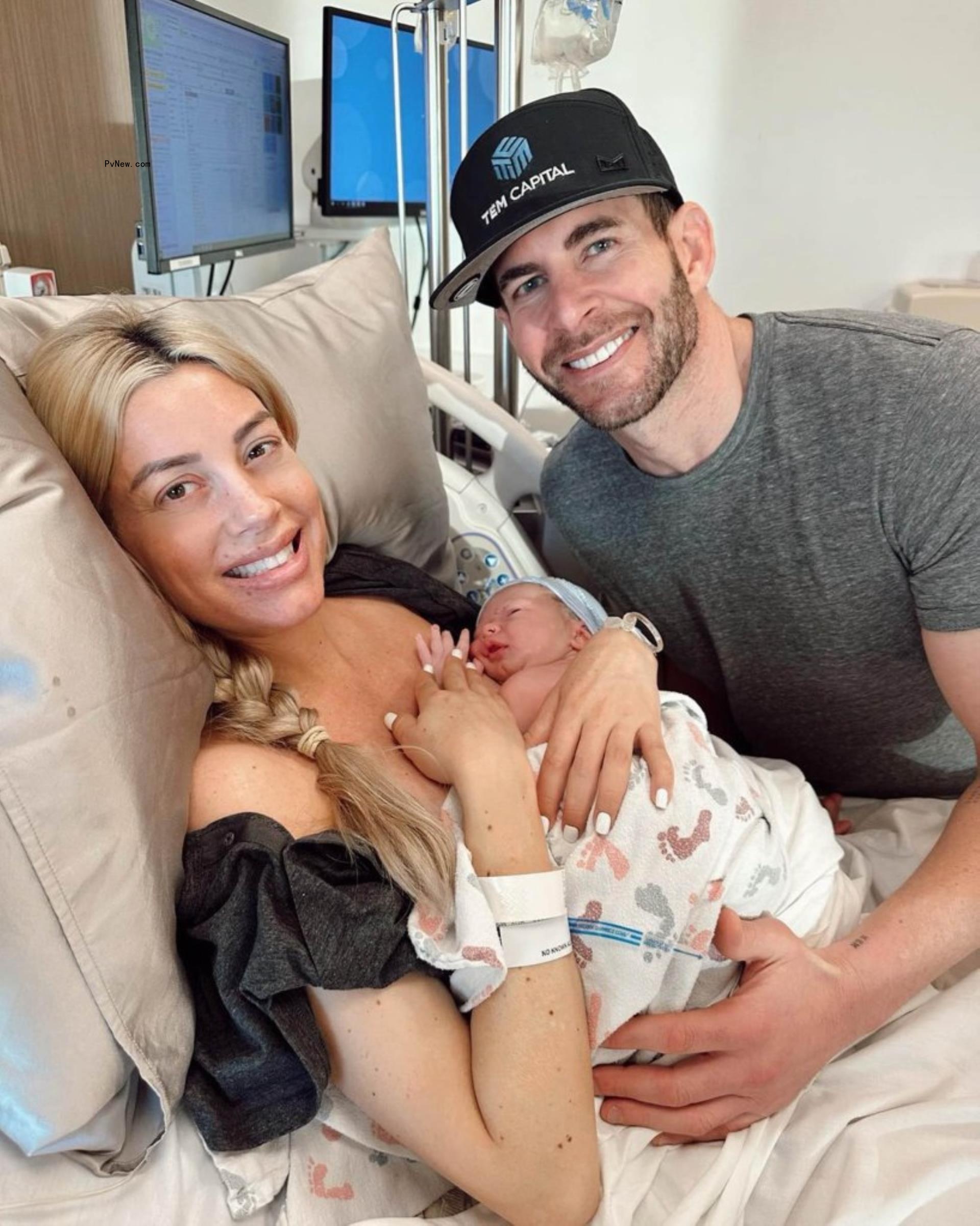 Heather Rae Young and Tarek El Moussa with their son Tristan in the hospital.