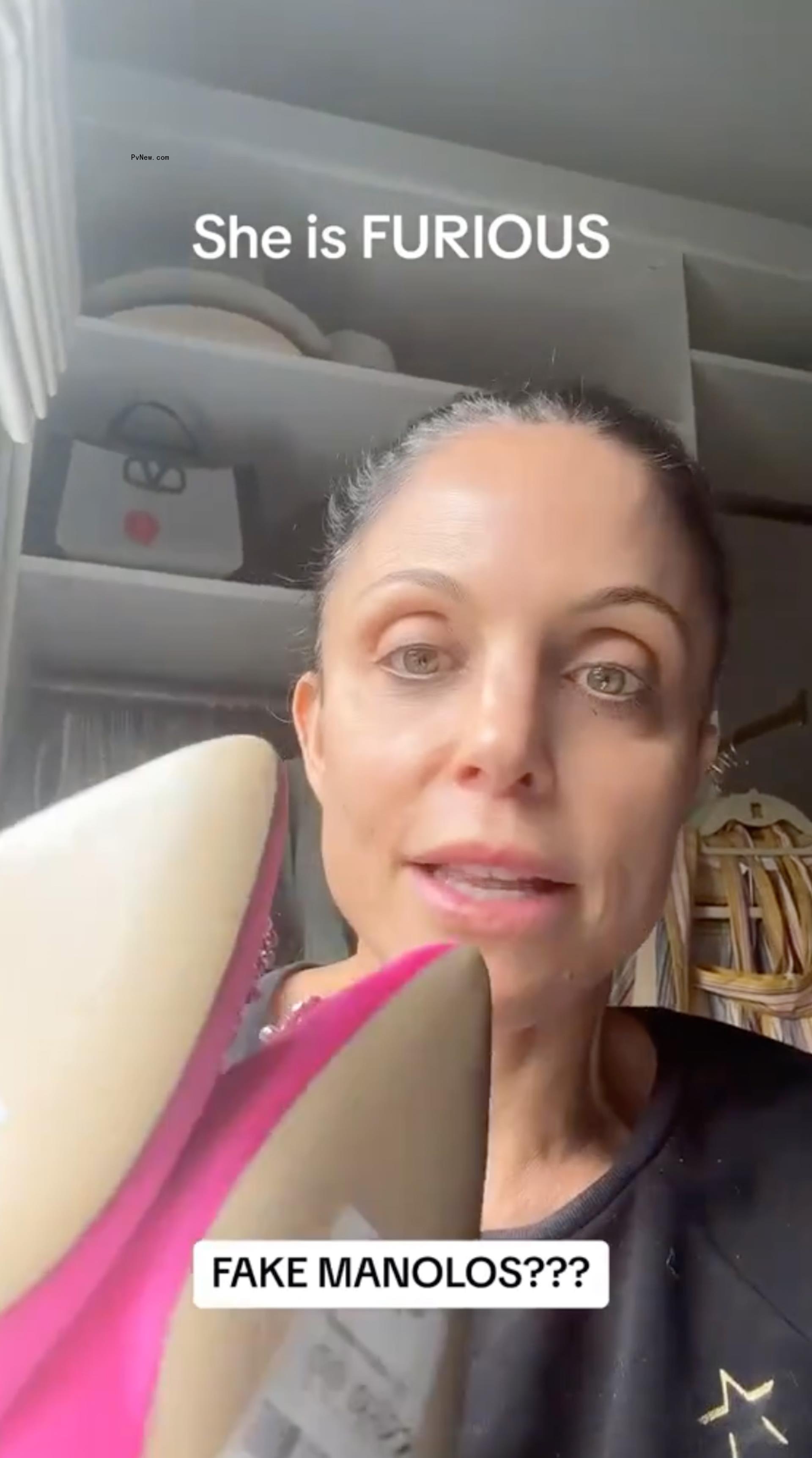 Bethenny Frankel holding pink heels.
