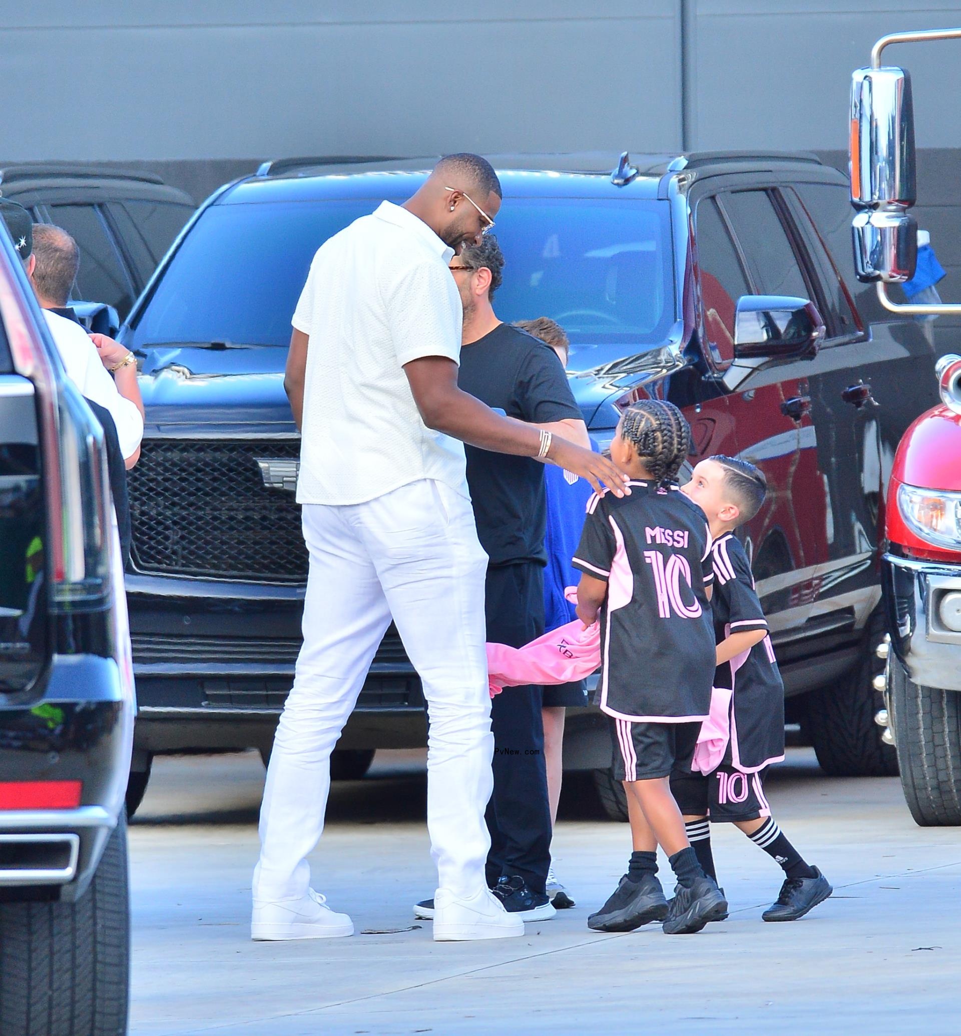 Tristan Thompson with children, including Saint West.