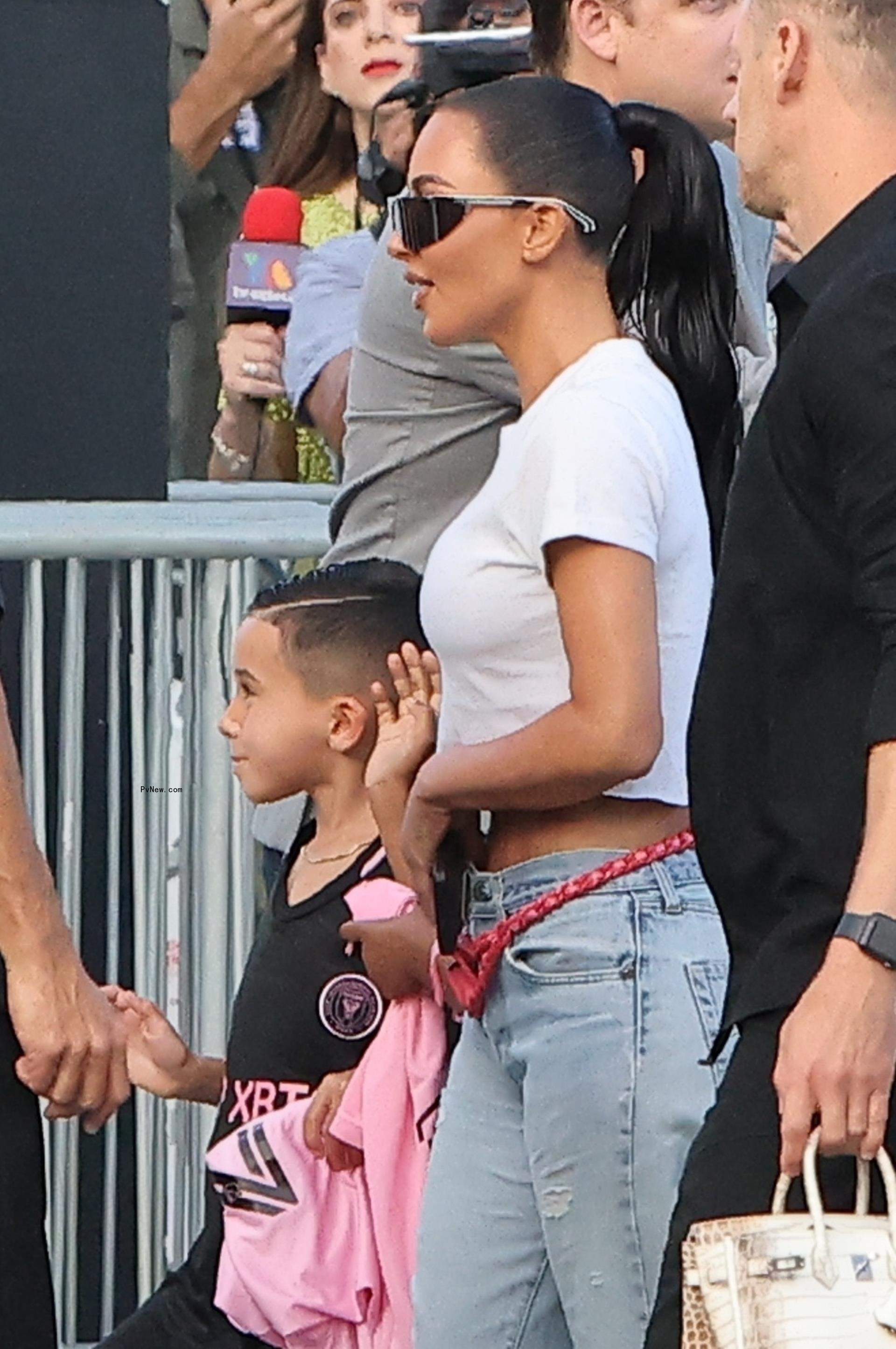 Kim Kardashian with a child
