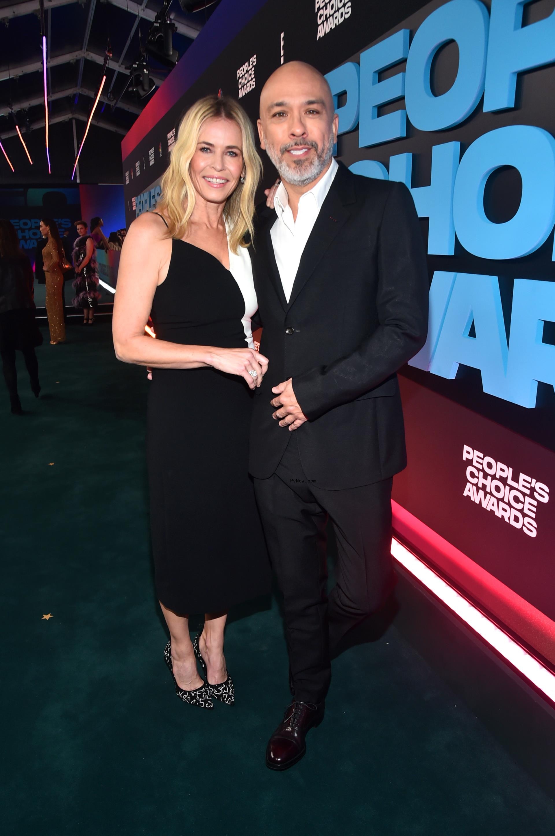 Jo Koy and Chelsea Handler on a red carpet.