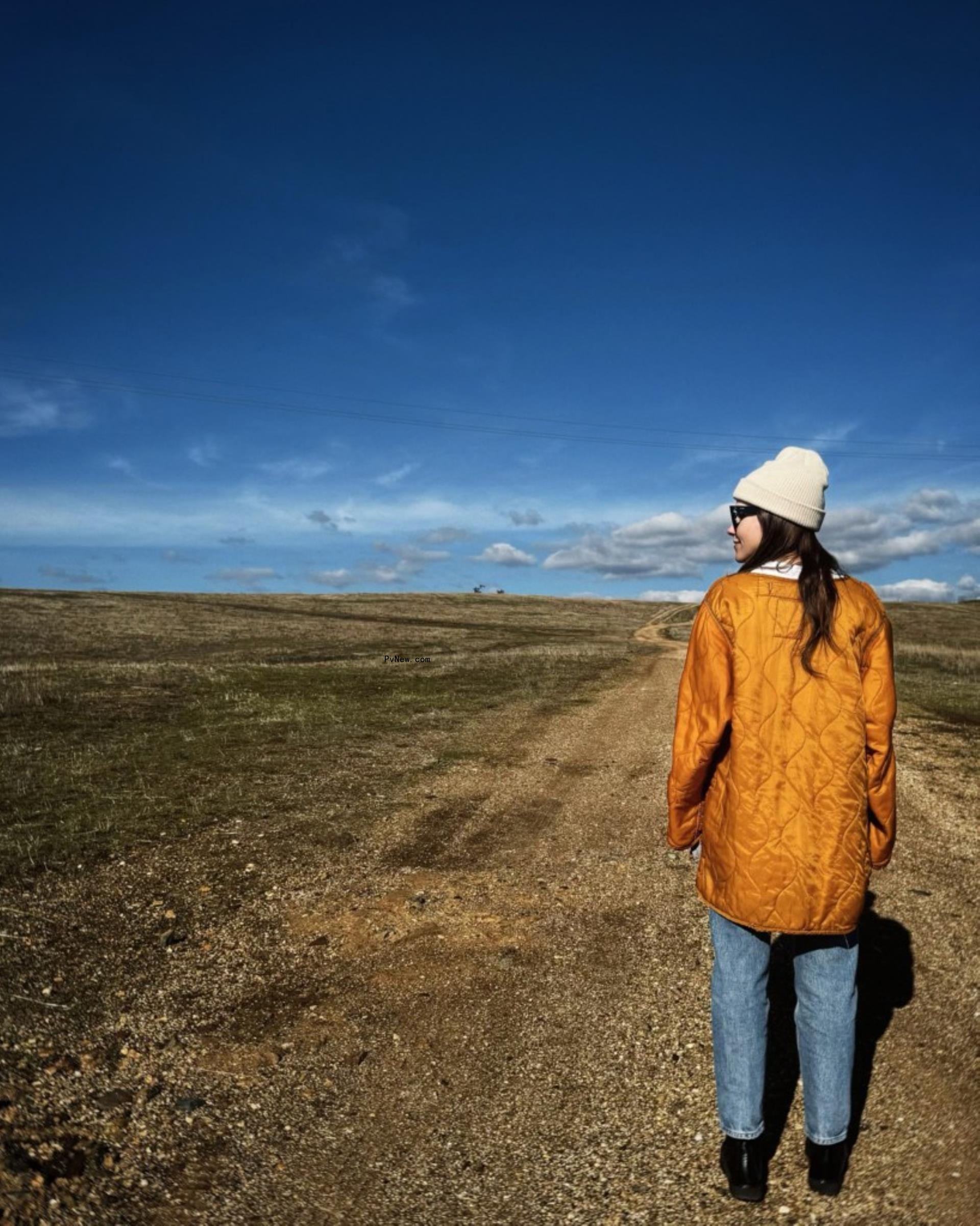 sophia bush on a dirt road staring into the abyss
