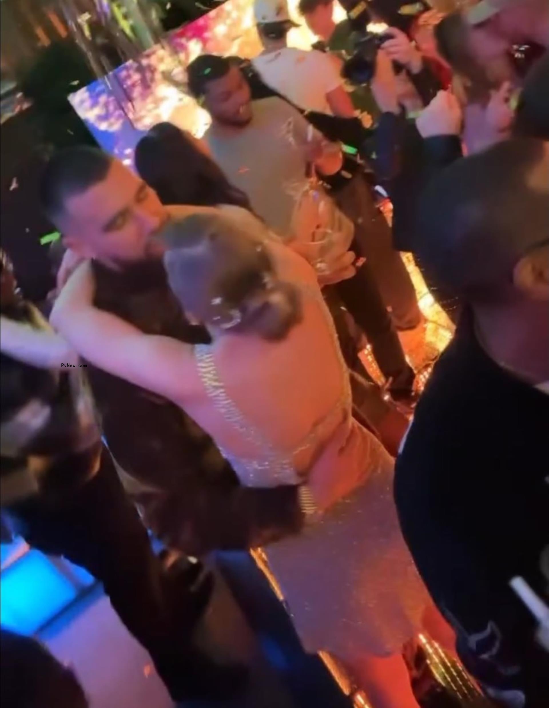Taylor Swift, Travis Kelce on the dance floor.