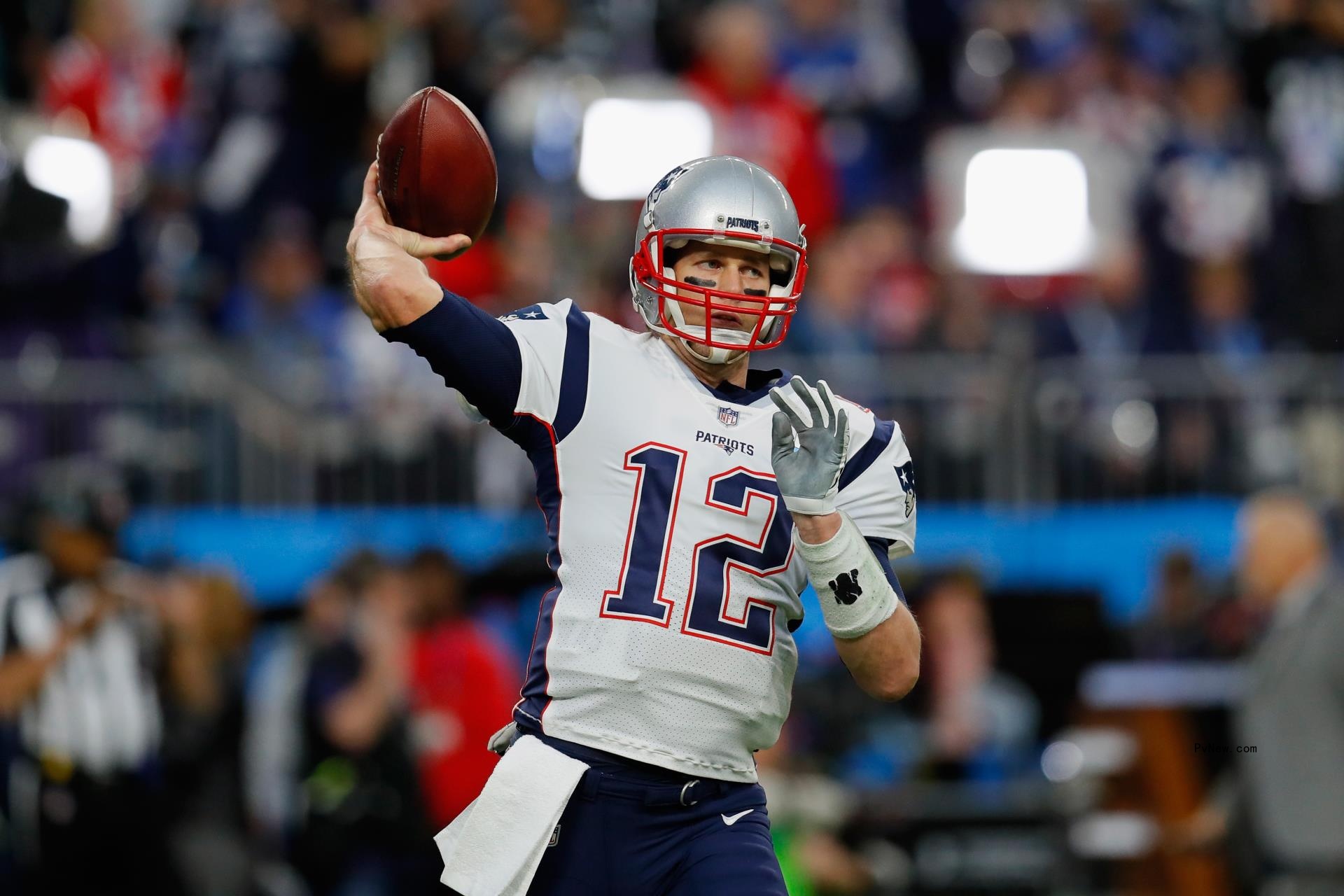 Tom Brady throwing a football