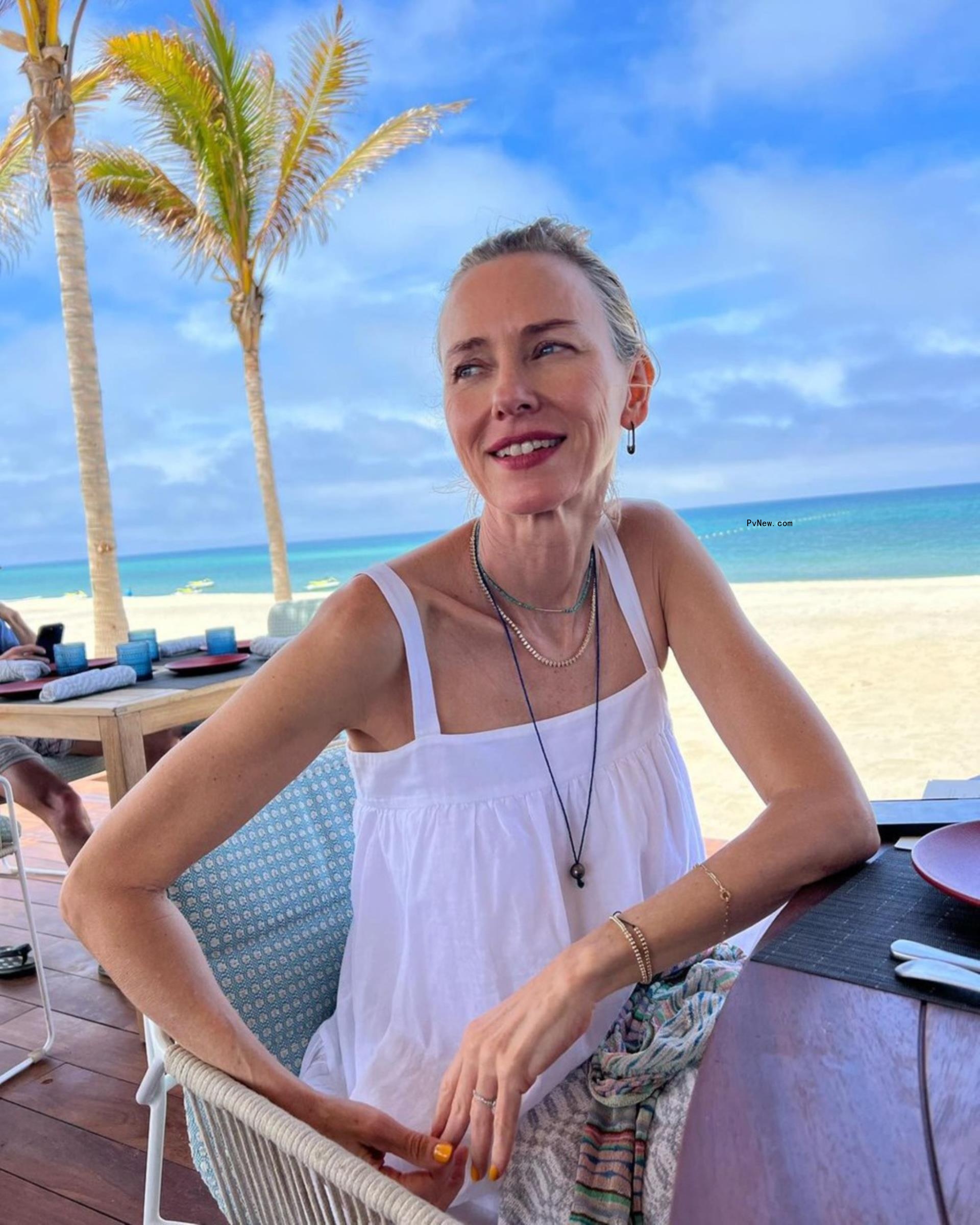 Naomi Watts on the beach.