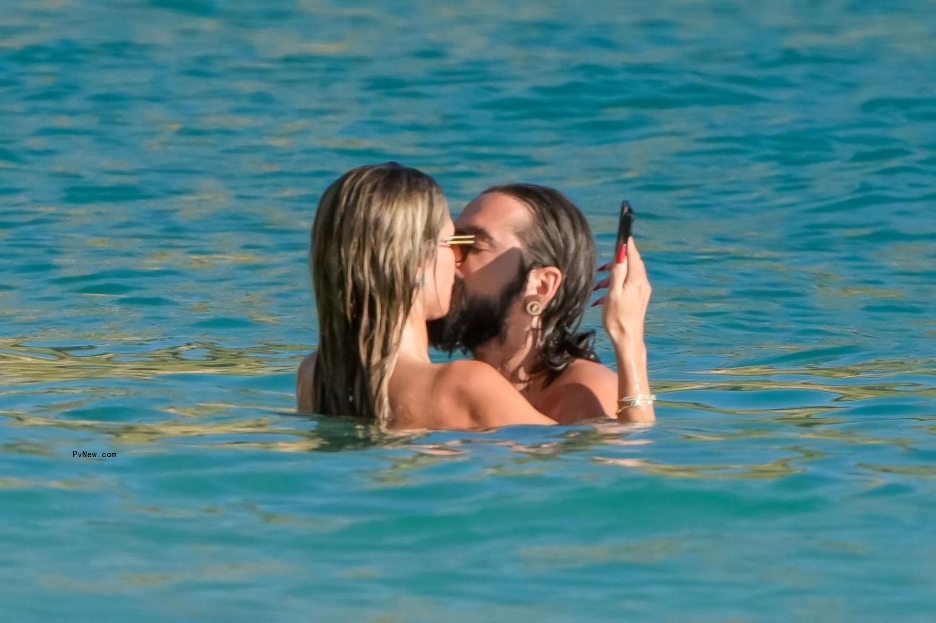 Heidi Klum hits the beach without a top again on St. Barts vacation with husband Tom Kaulitz
