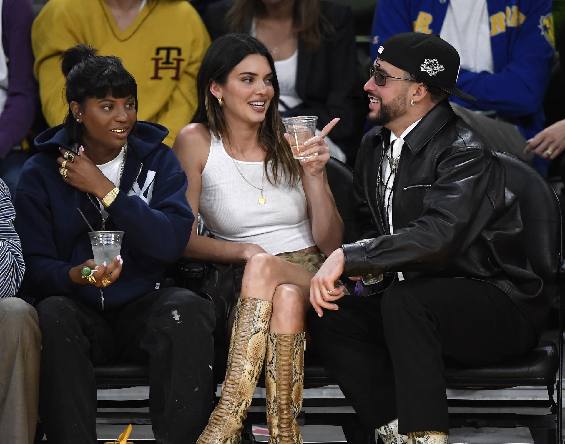Kendall Jenner and Bad Bunny sitting together