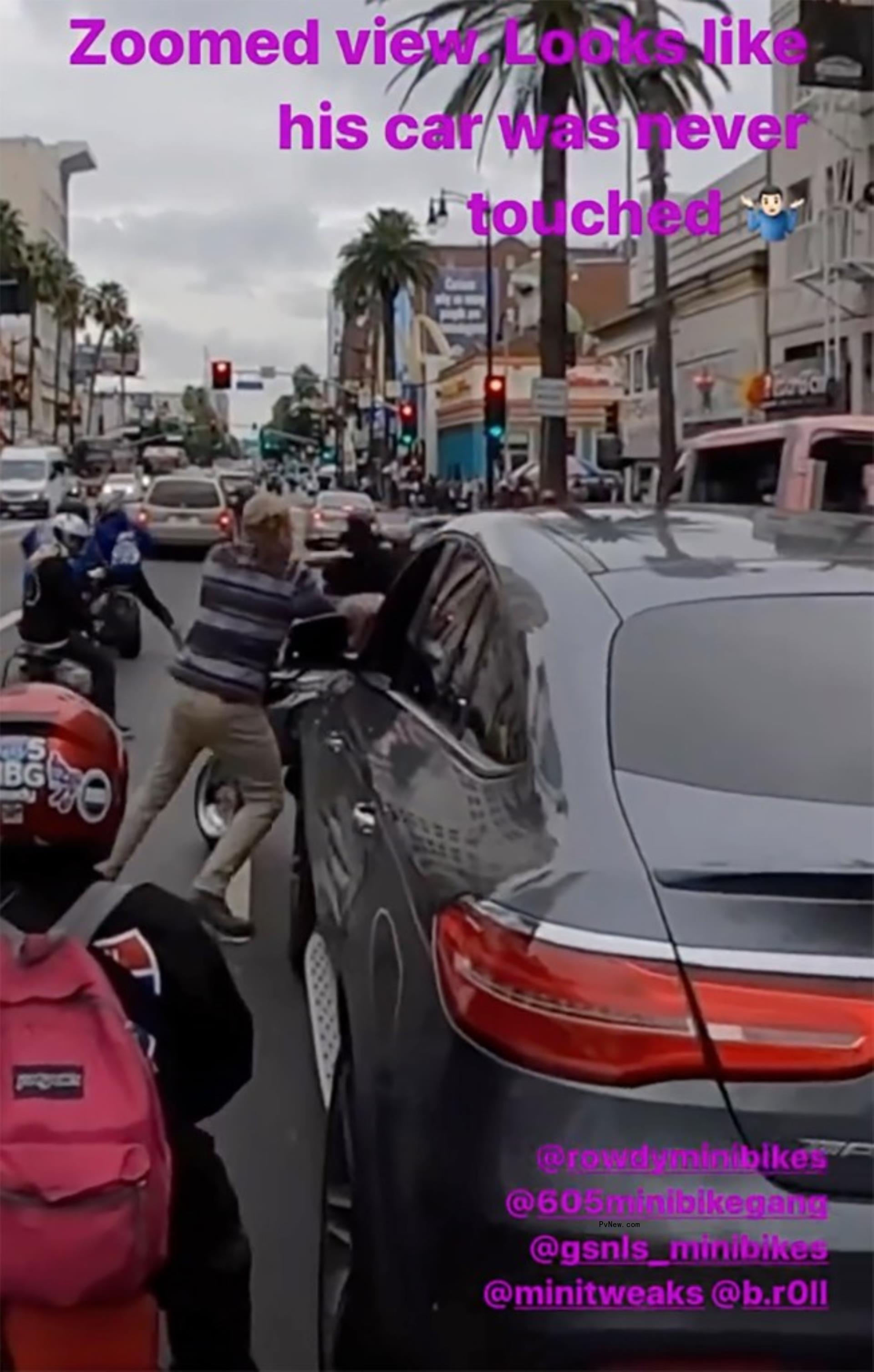 screenshot of ian ziering shoving a biker guy