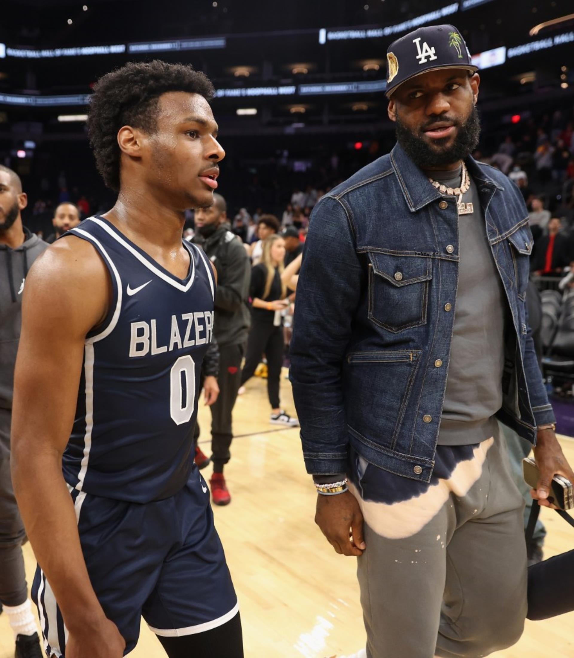 lebron james talking to his son bro<i></i>nny on the basketball court