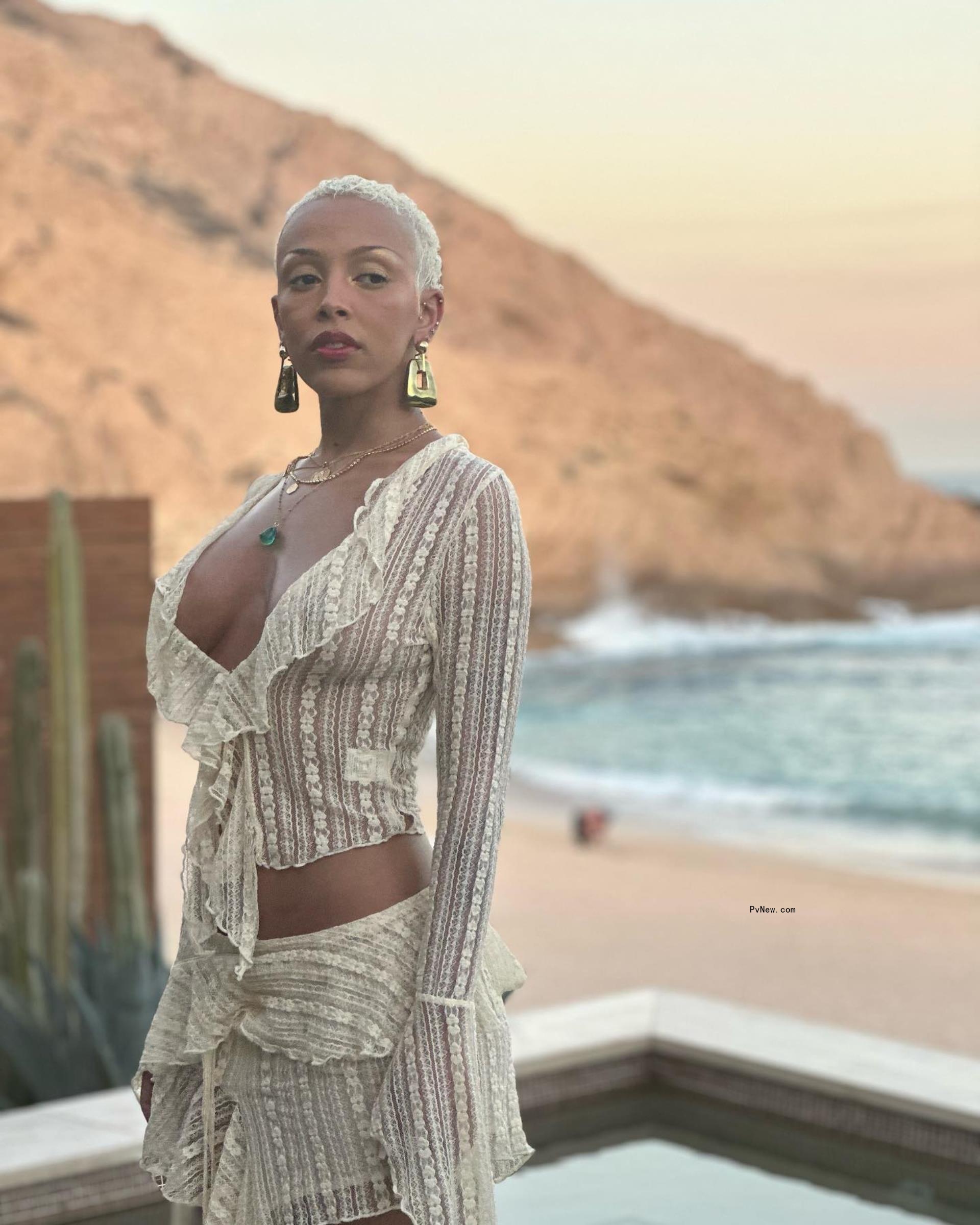 Doja Cat in a white outfit.