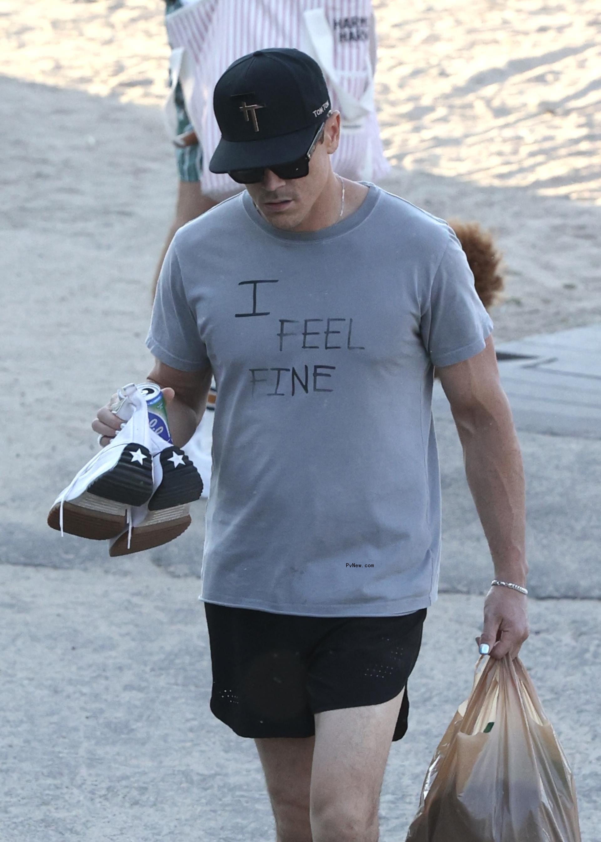 Tom Sandoval walking on the beach