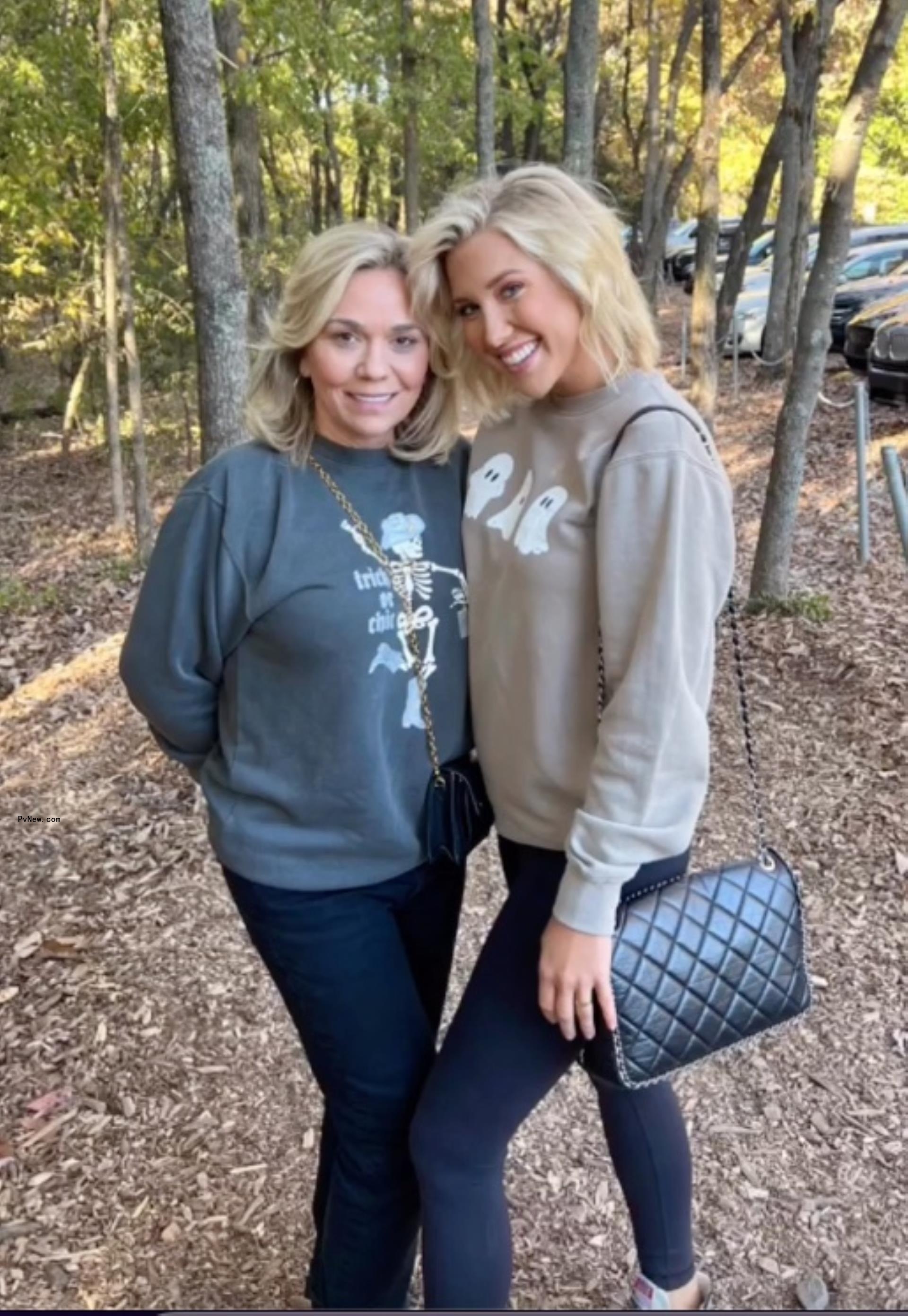 Savannah and Julie Chrisley posing for a photo together