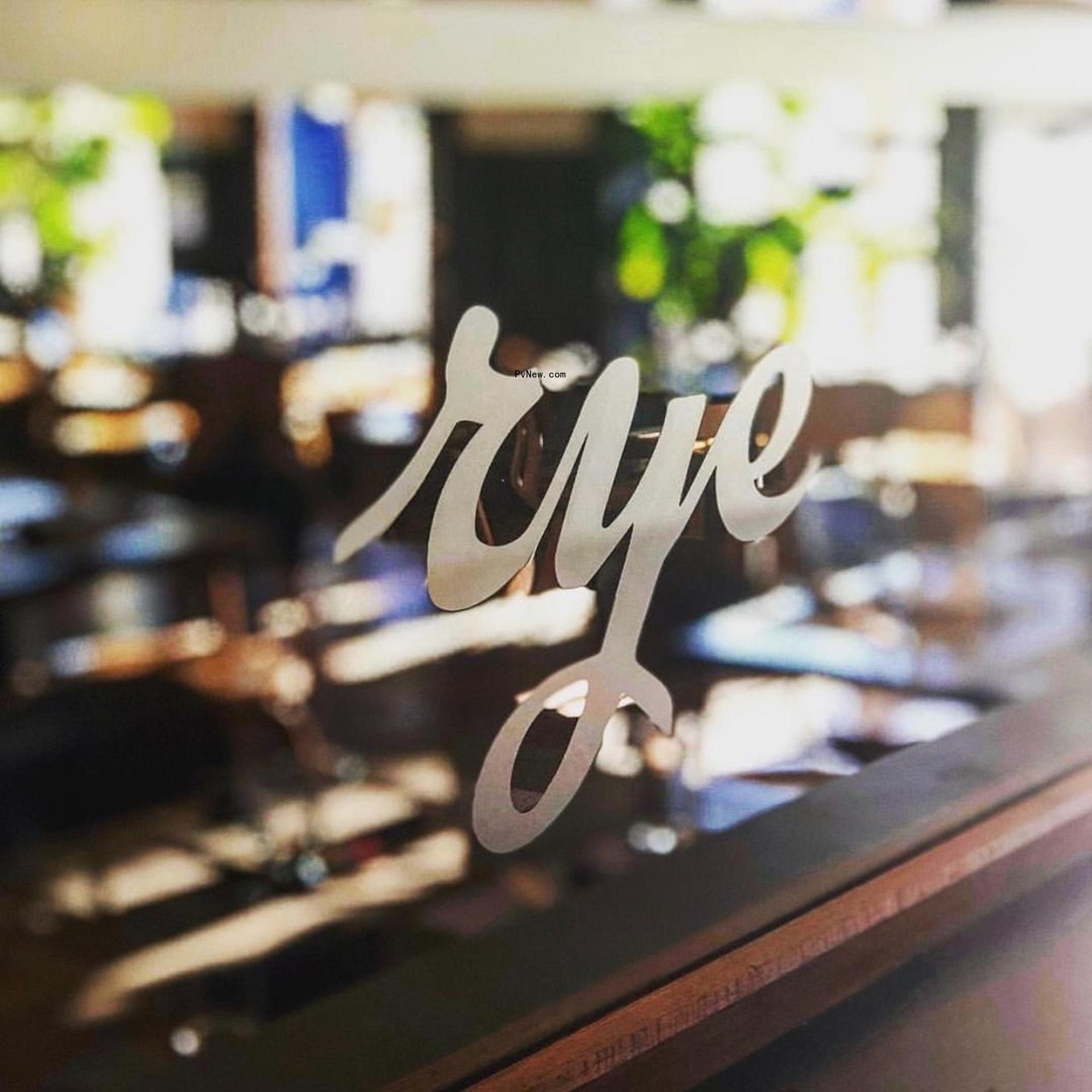 An exterior shot of Rye restaurant's sign.