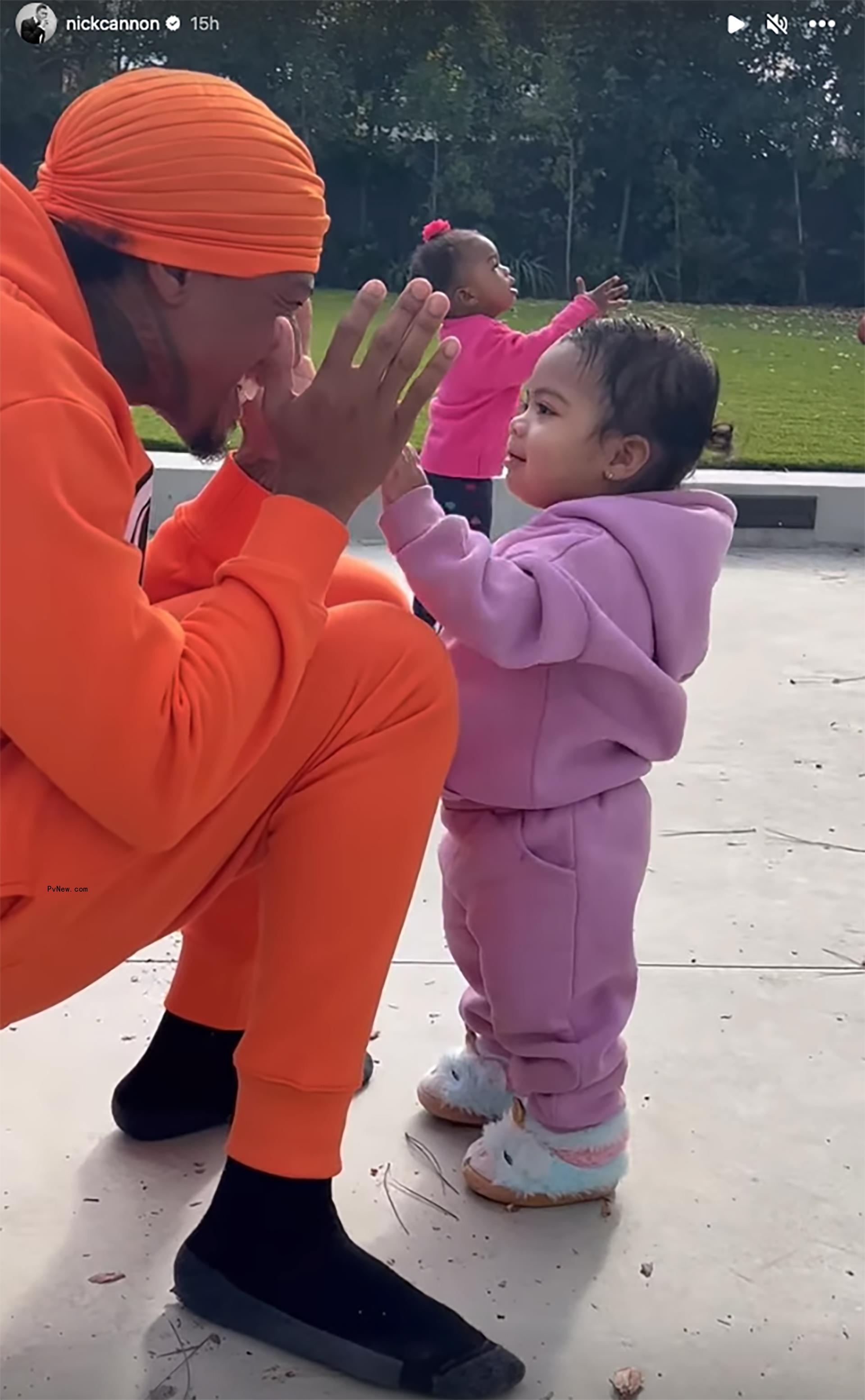 Nick Cannon playing with his daughter Beautiful