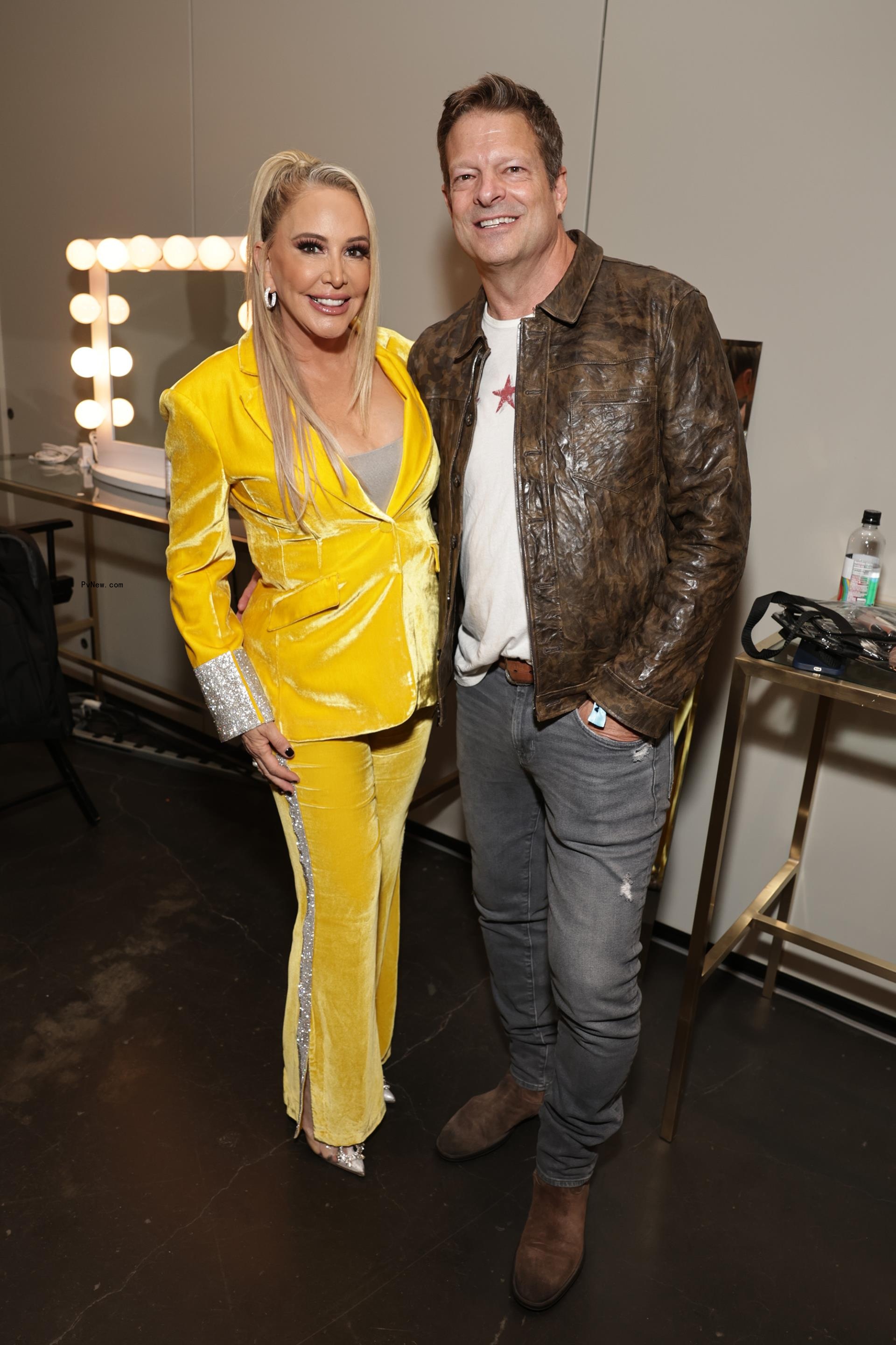 Shannon Beador and John Janssen posing for a photo together