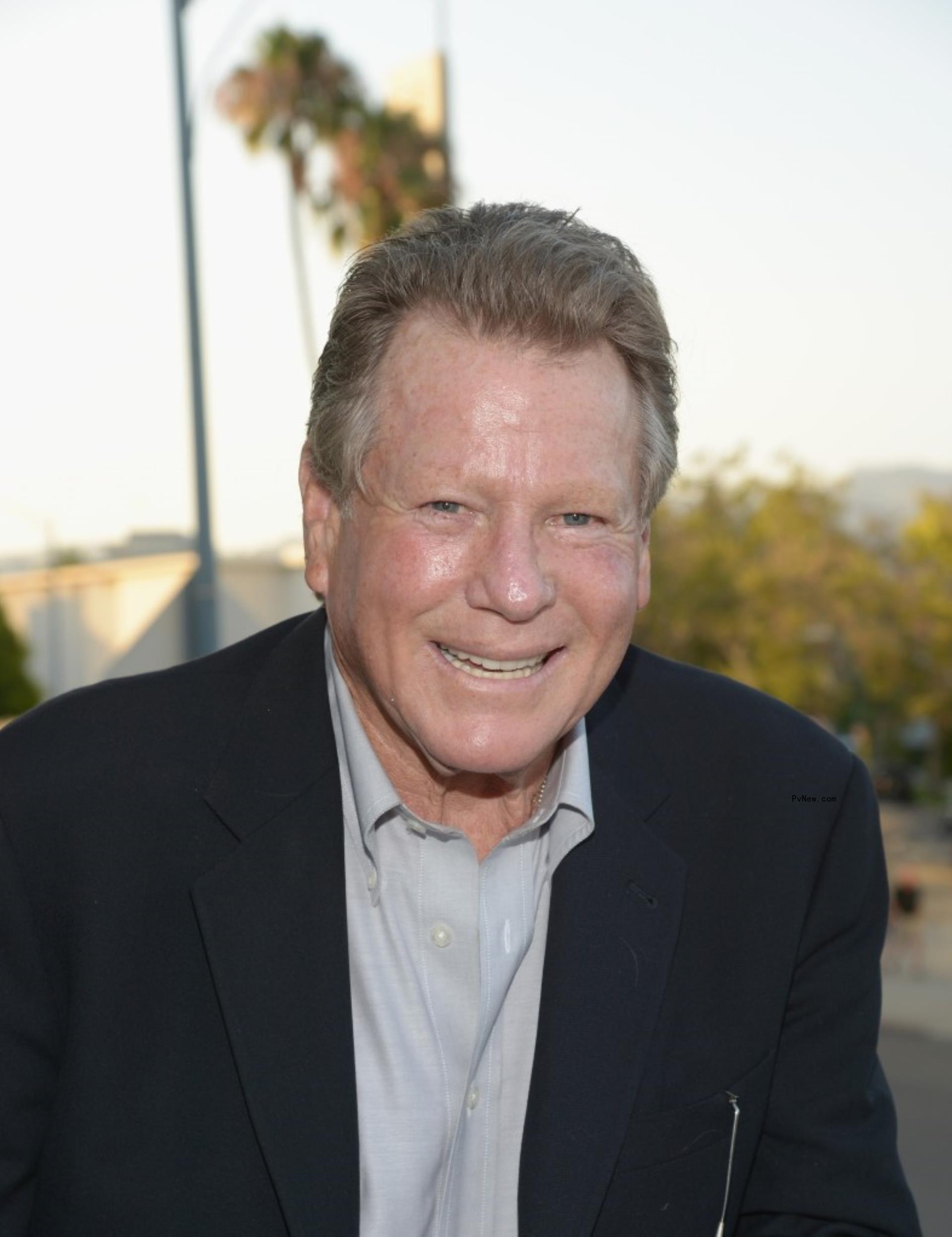 Ryan O'Neal smiling