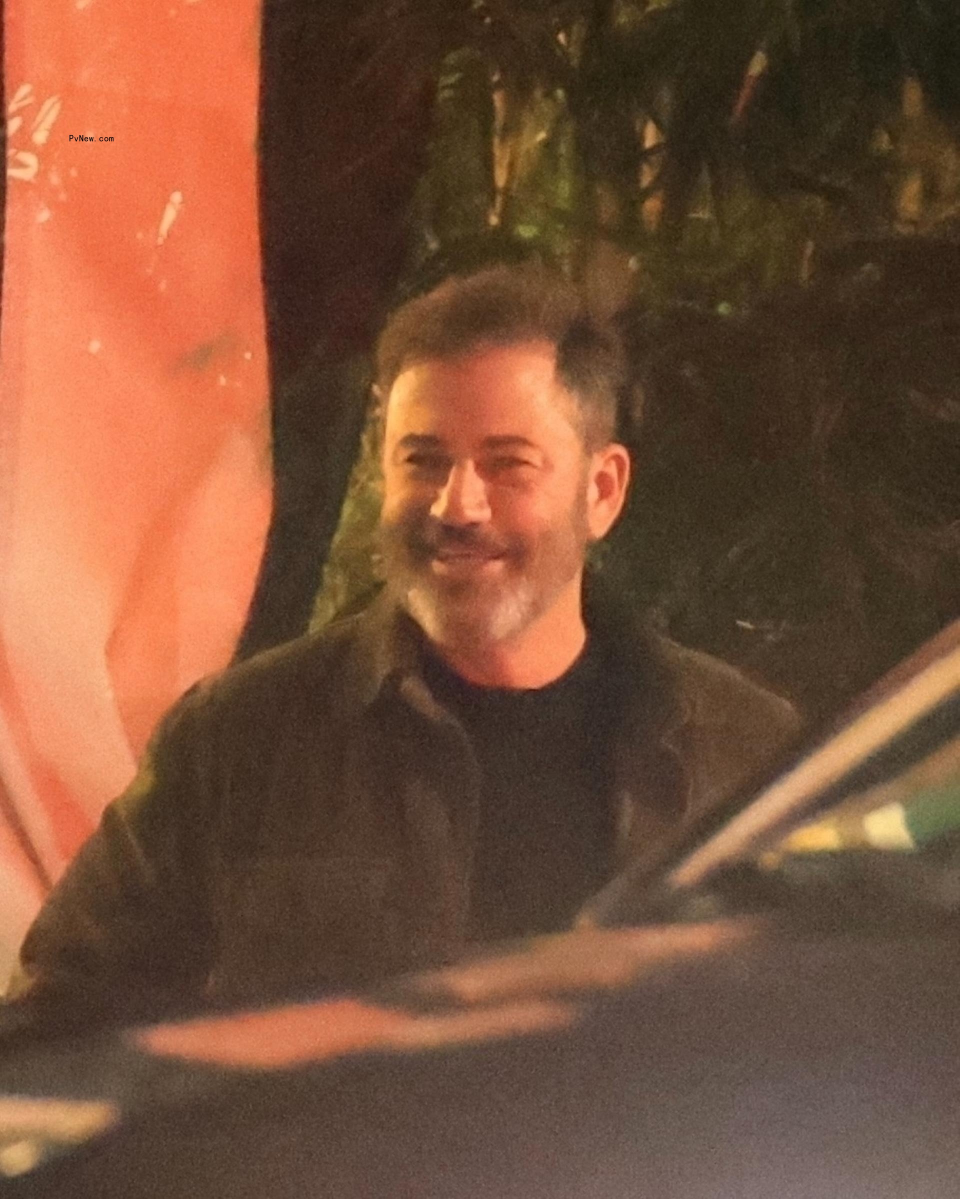 Jimmy Kimmel leaving a restaurant.