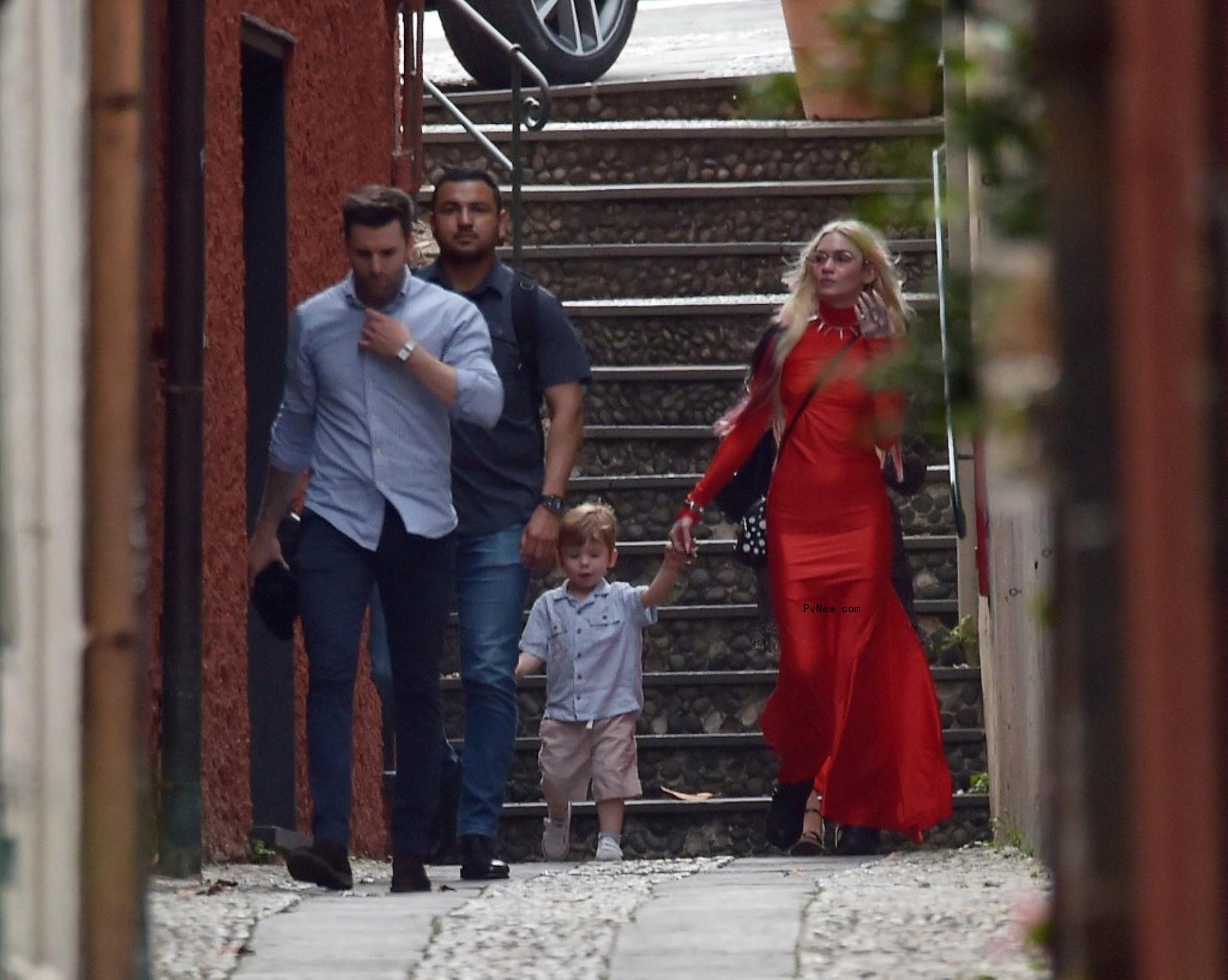 Grimes going for a walk with her son in Italy.