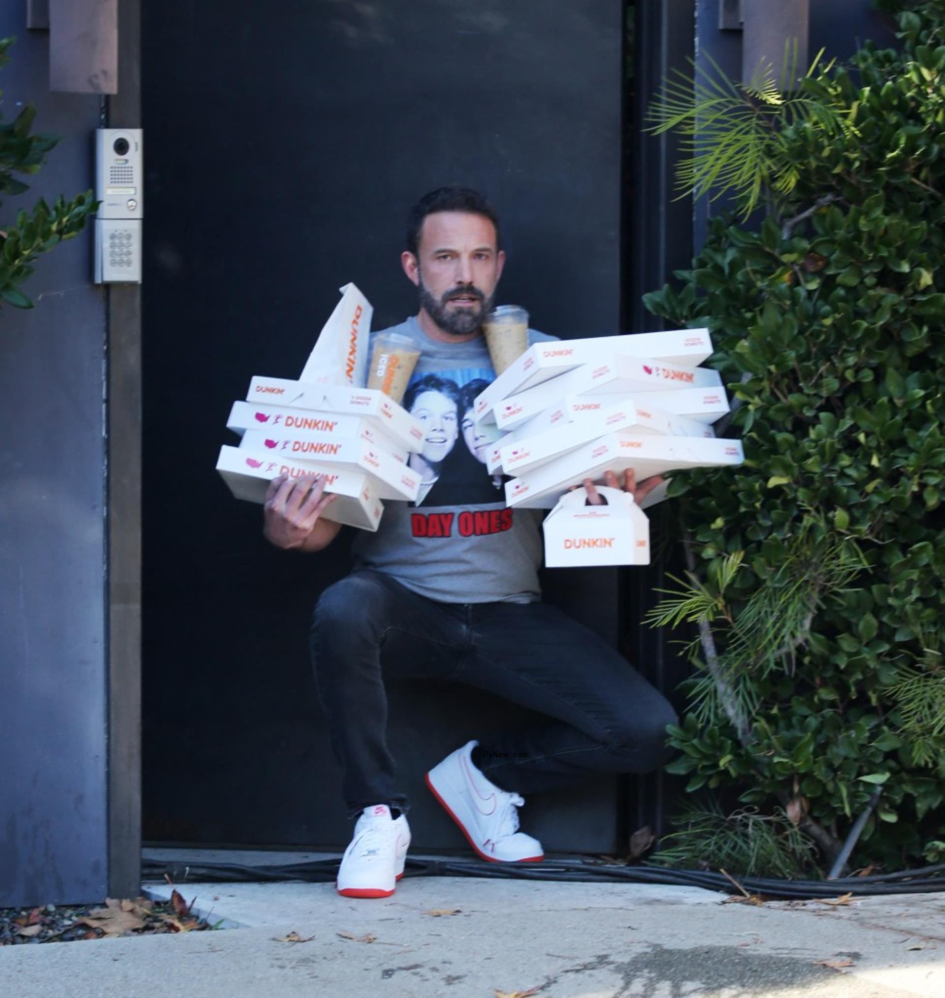 Beb Affleck filming a Dunkin' commercial. 