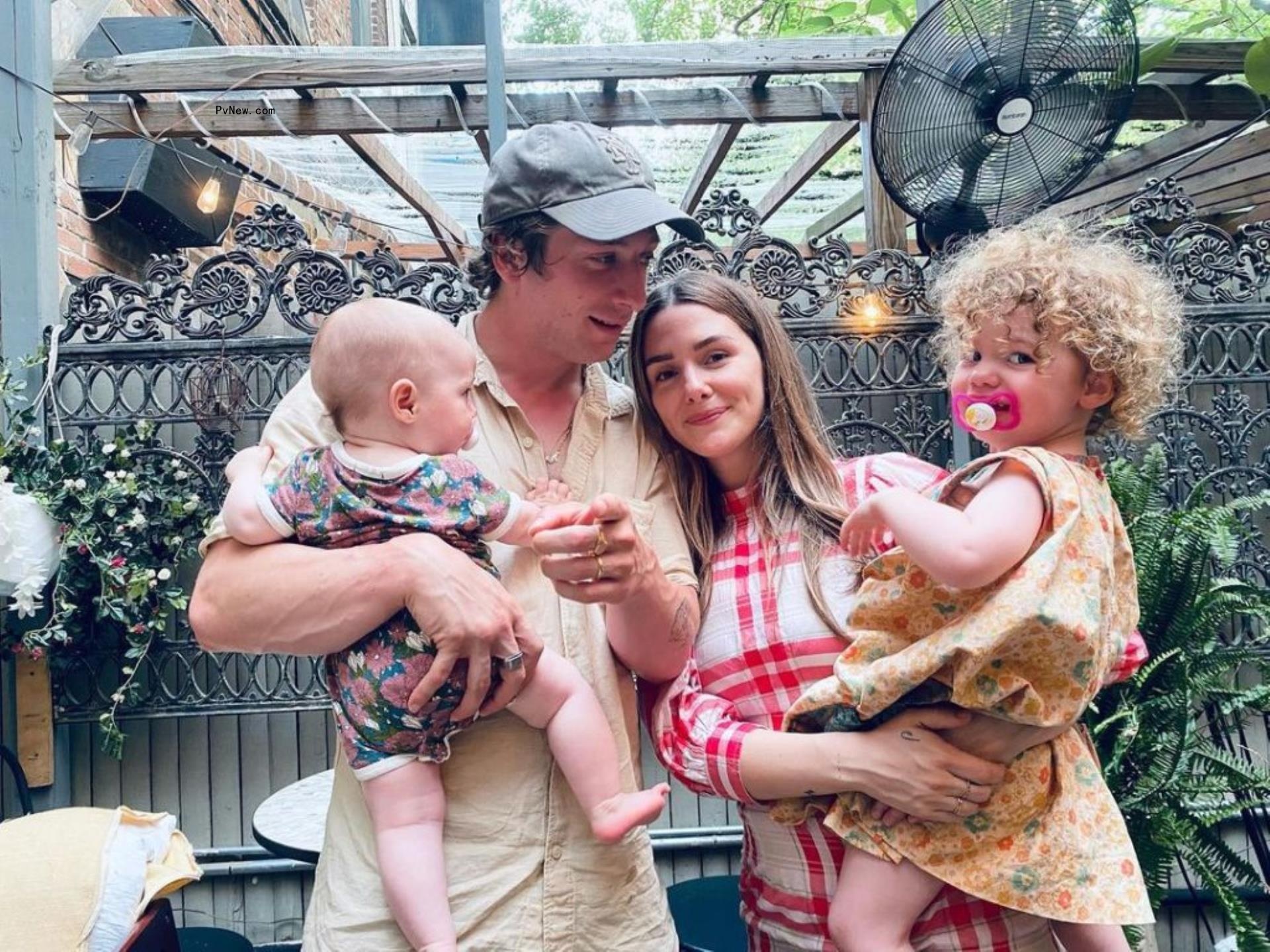 Jeremy Allen White and Addison timlin holding their daughters