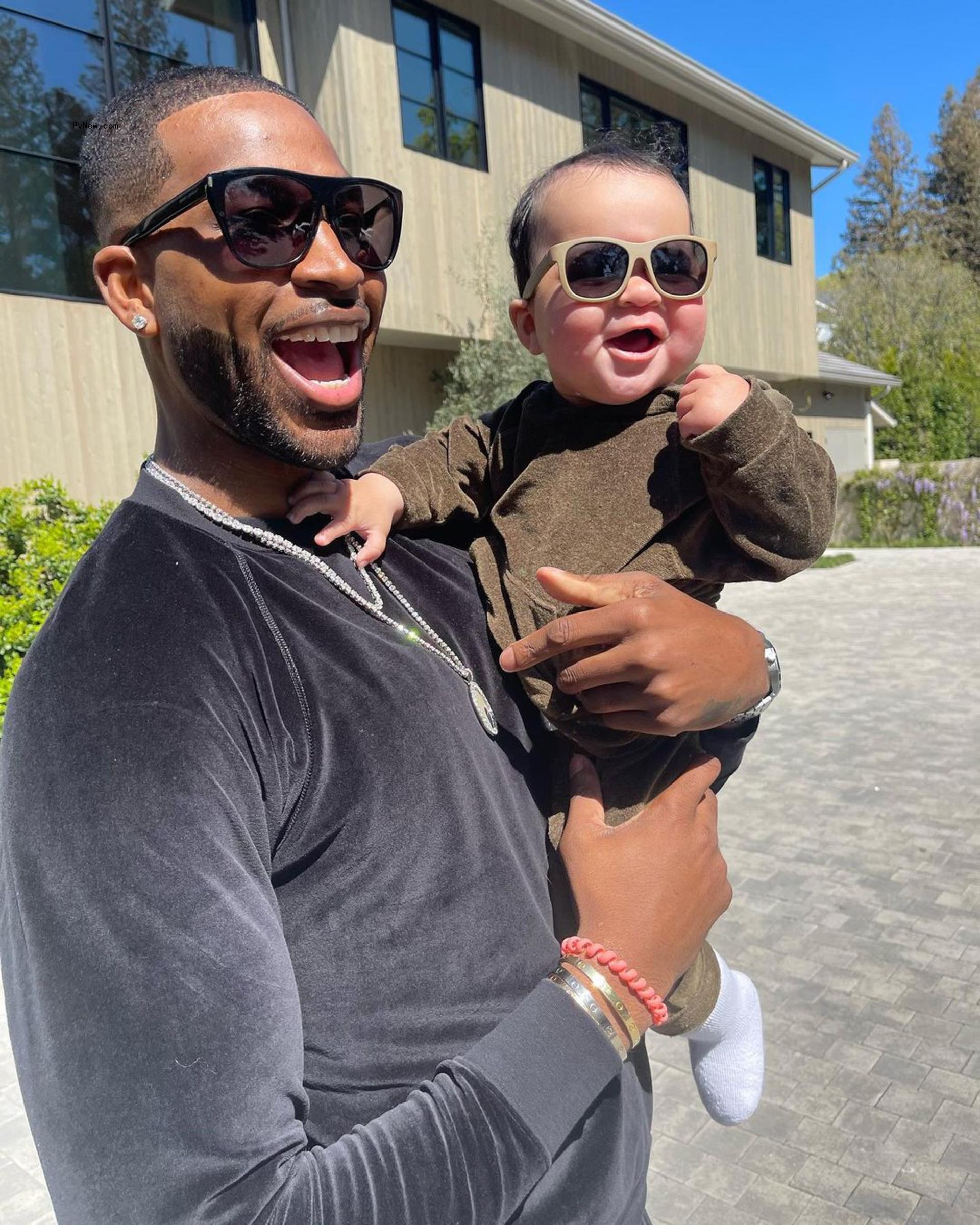 Tristan Thompson holding his son Tatum.