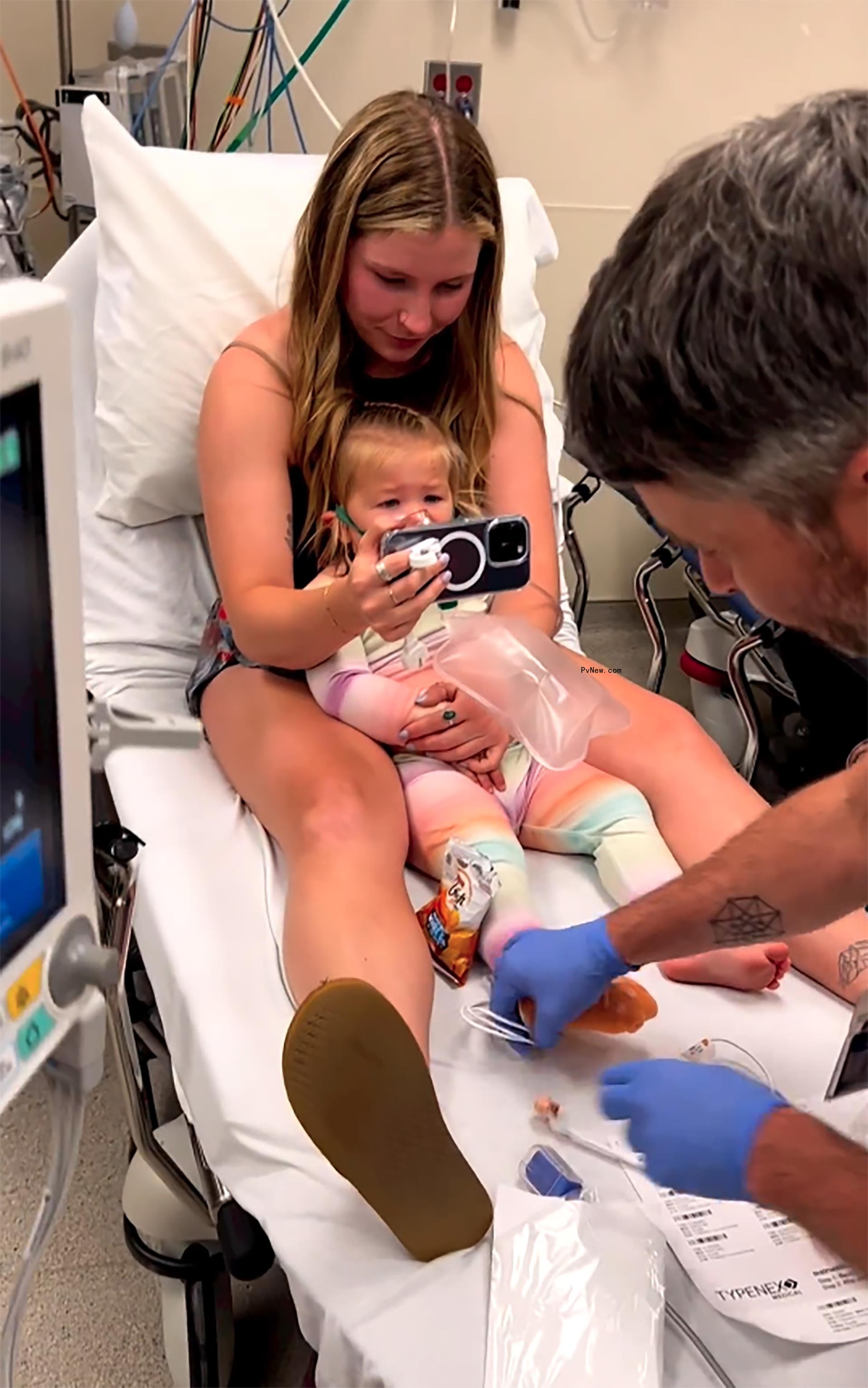 Morgan Miller with her daughter in the hospital.