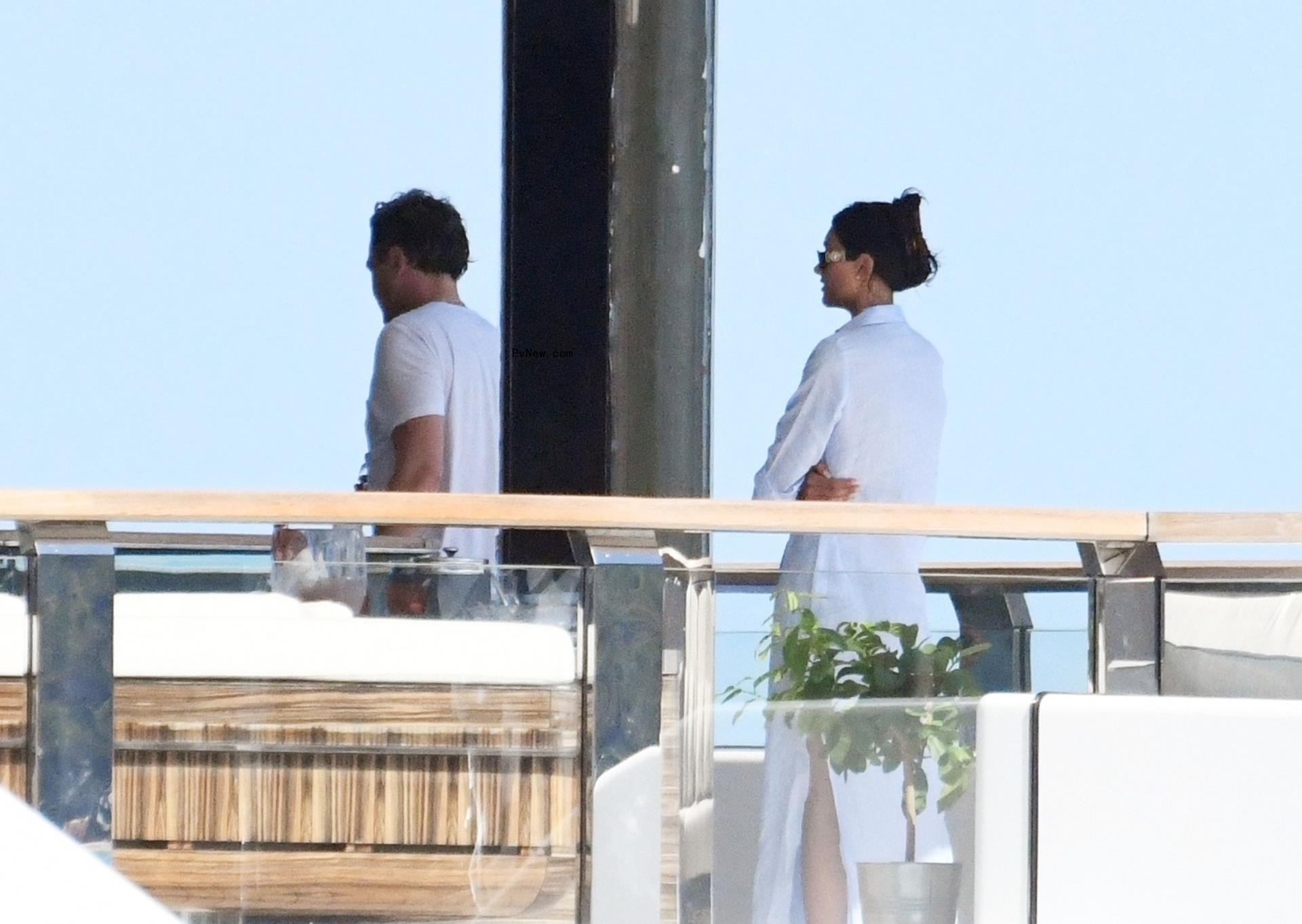Leo DiCaprio and Neelam Gill on a yacht.