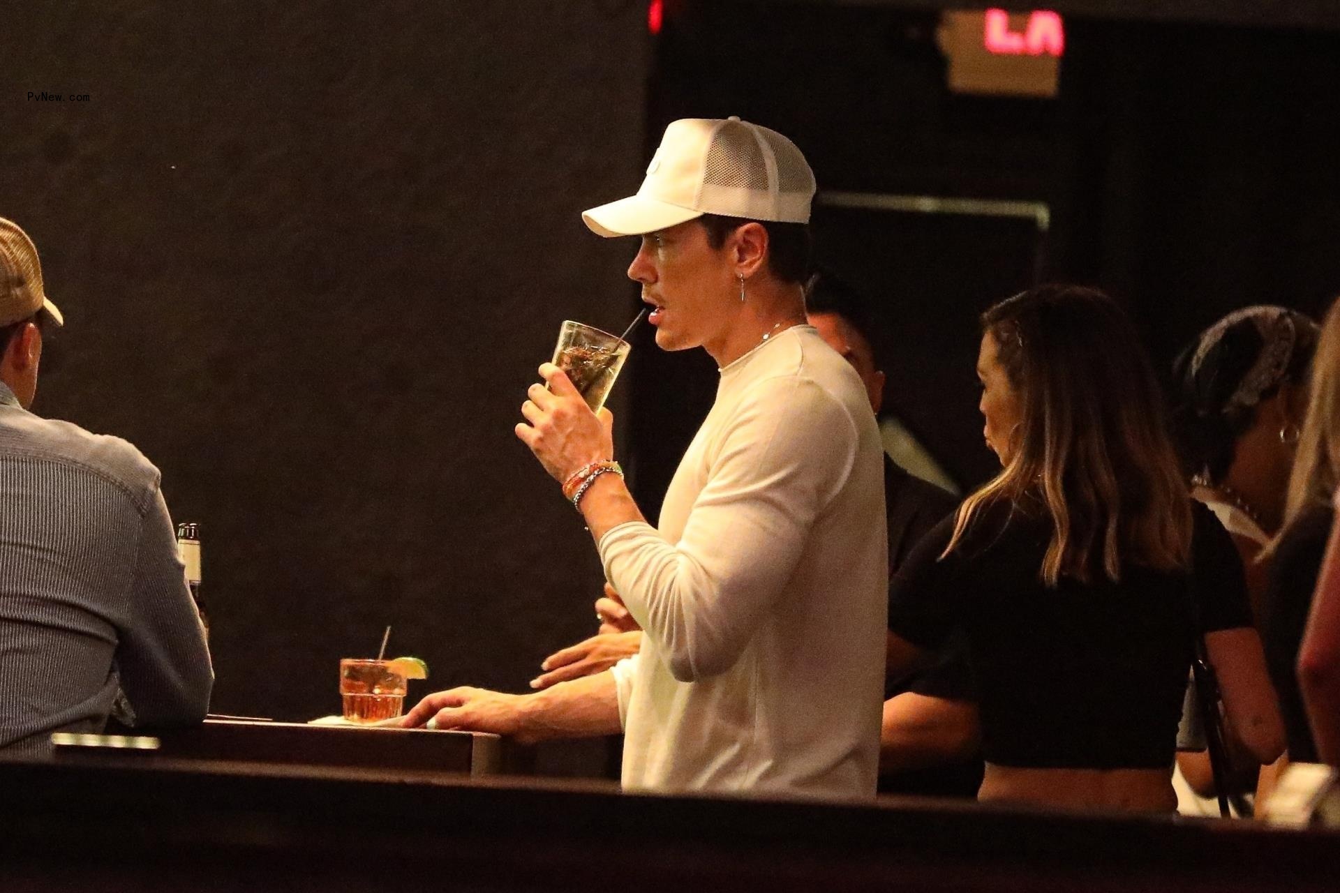 Tom Sandoval drinking