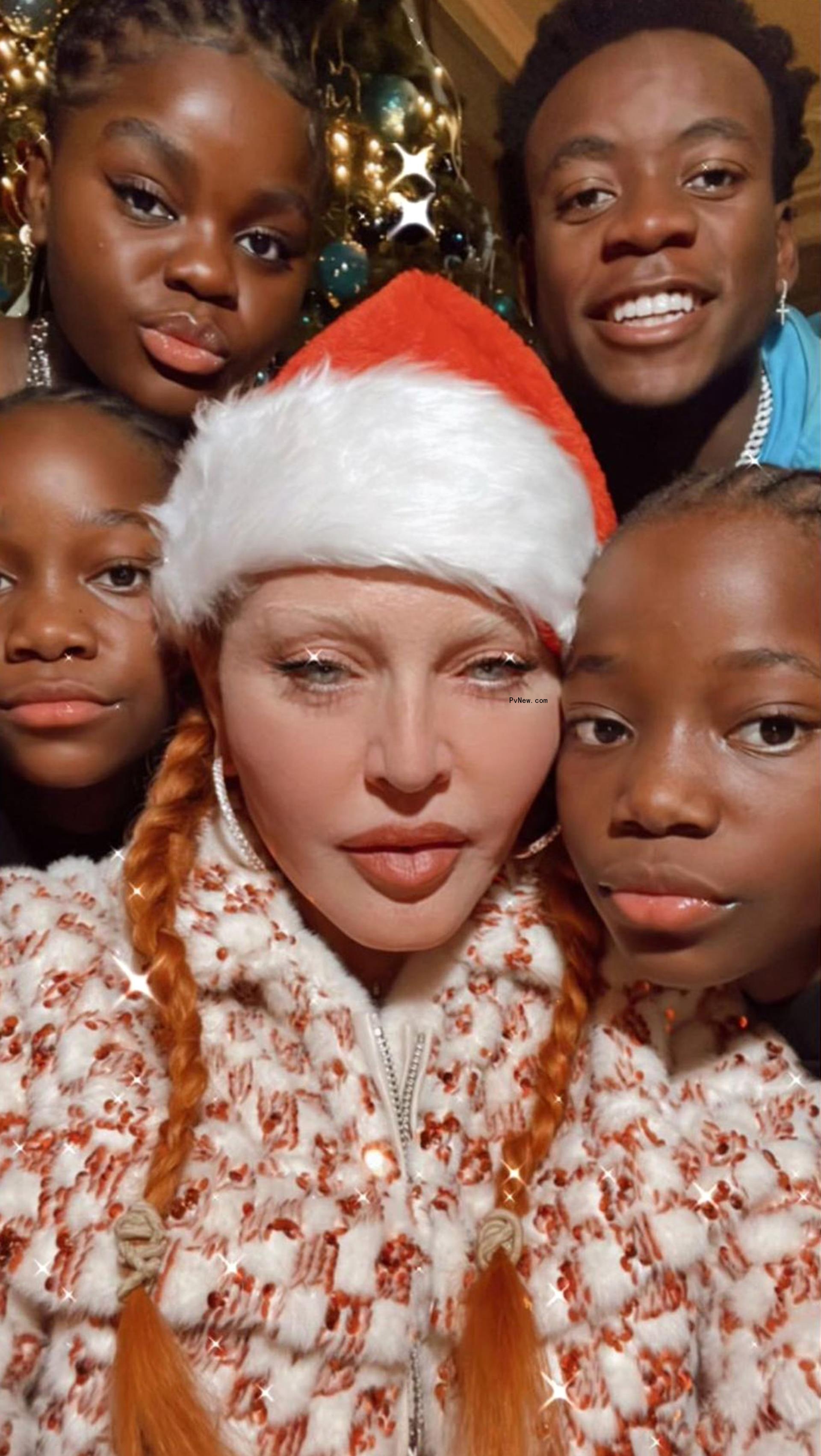 Mado<i></i>nna with son David Banda and daughters Mercy, Stella and Estere