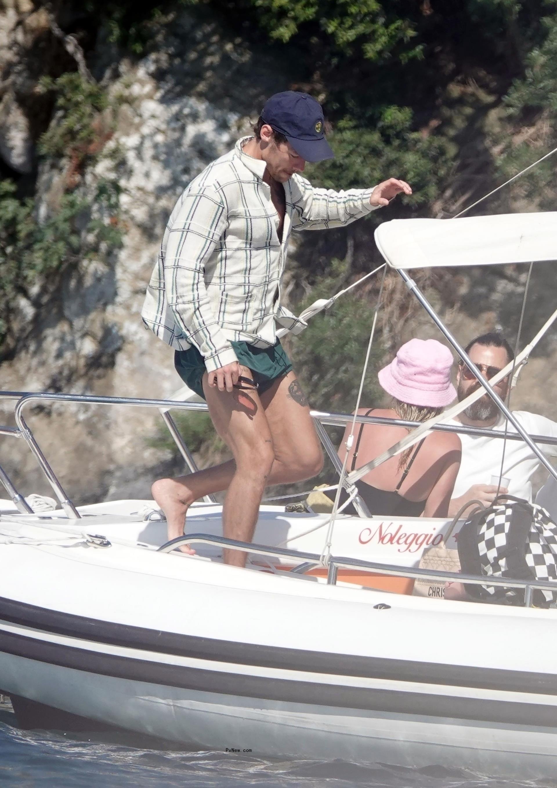 Harry Styles on boat