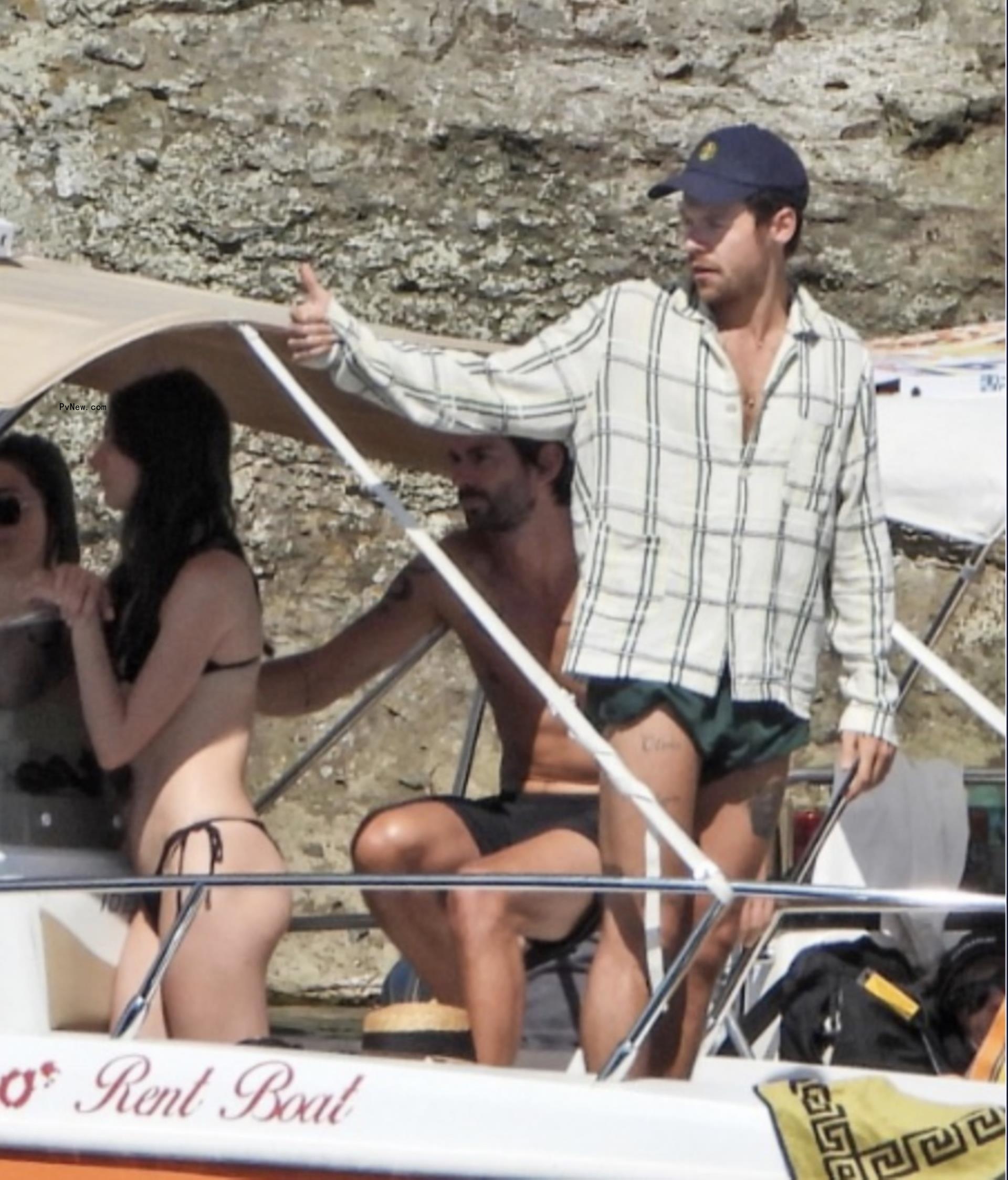 Harry Styles on boat