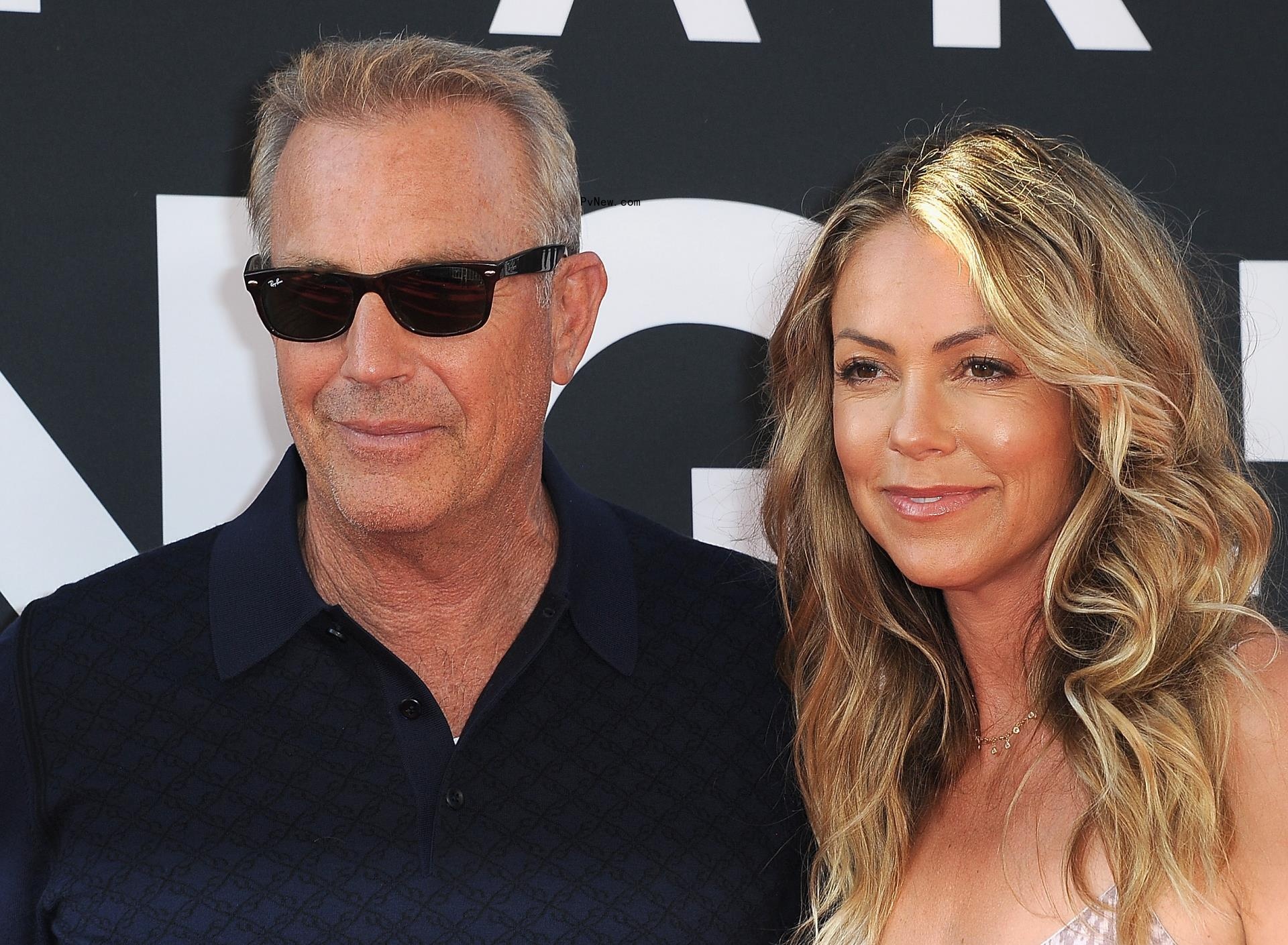 Kevin Costner and Christine Baumgartner at an event in 2019.