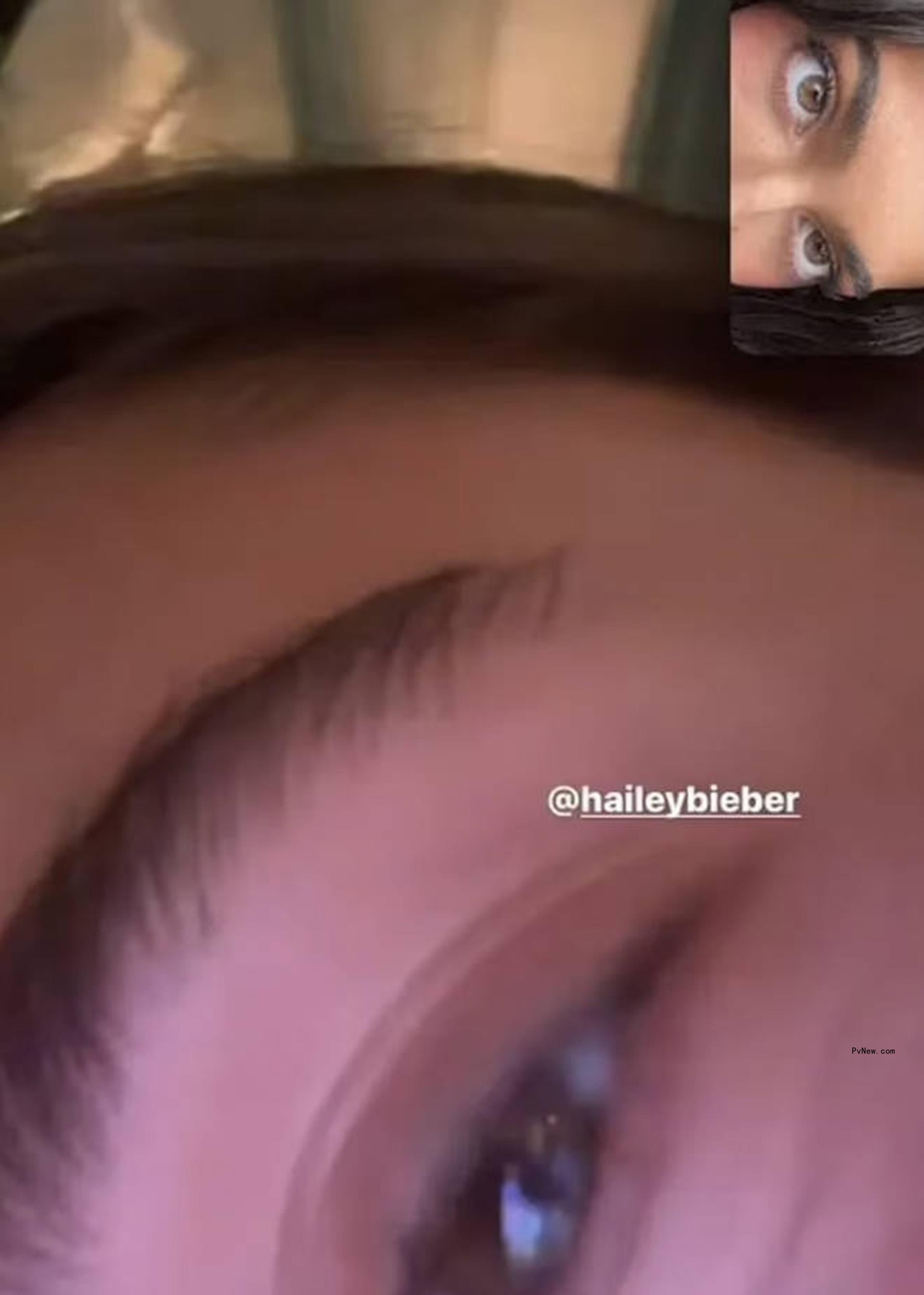 Up close of Hailey Bieber's eyebrows.